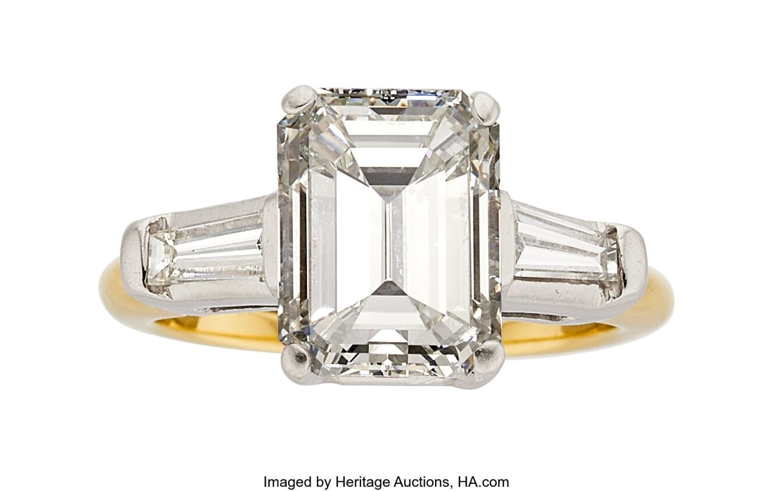 Diamond, Platinum, Gold Ring Stones: Emerald-cu: Diamond, Platinum, Gold Ring Stones: Emerald-cut diamond weighing 3.23 carats; tapered baguette-cut diamonds weighing a total of approximately 0.35 carat Metal&col