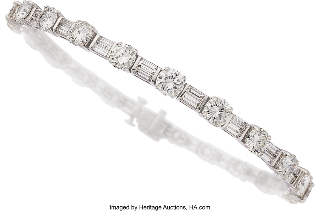 M. Waslikoff & Sons Diamond, Platinum Bracelet: M. Waslikoff & Sons Diamond, Platinum Bracelet Stones: Round brilliant and full-cut diamonds weighing a total of approximately 6.00 carats; baguette-cut diamonds wei