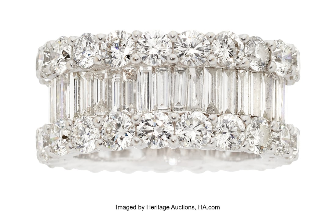 Diamond, White Gold Eternity Band Stones: Full-: Diamond, White Gold Eternity Band Stones: Full-cut diamonds weighing a total of approximately 5.00 carats; baguette-cut diamonds weighing a total of approximately 4.20 c