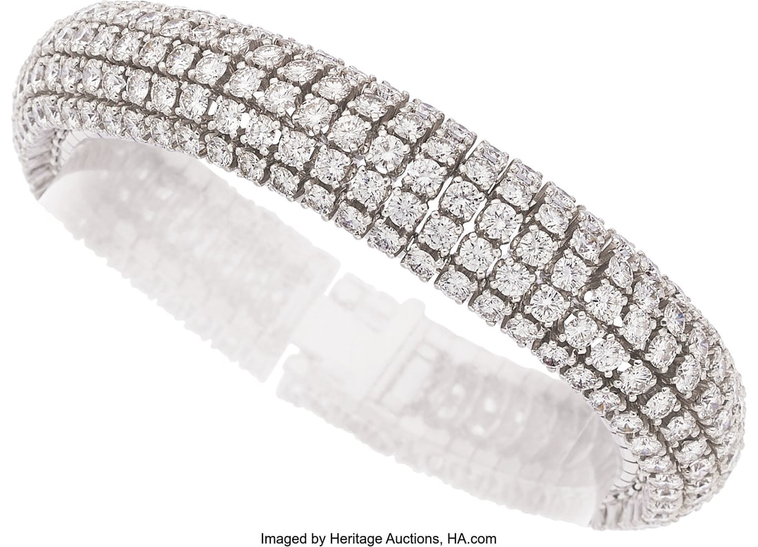 Diamond, Platinum Bracelet Stones: Full-cut dia: Diamond, Platinum Bracelet Stones: Full-cut diamonds weighing a total of approximately 16.00 carats Metal: Platinum Gross Weight: 72.80 grams Dimensions: 6-