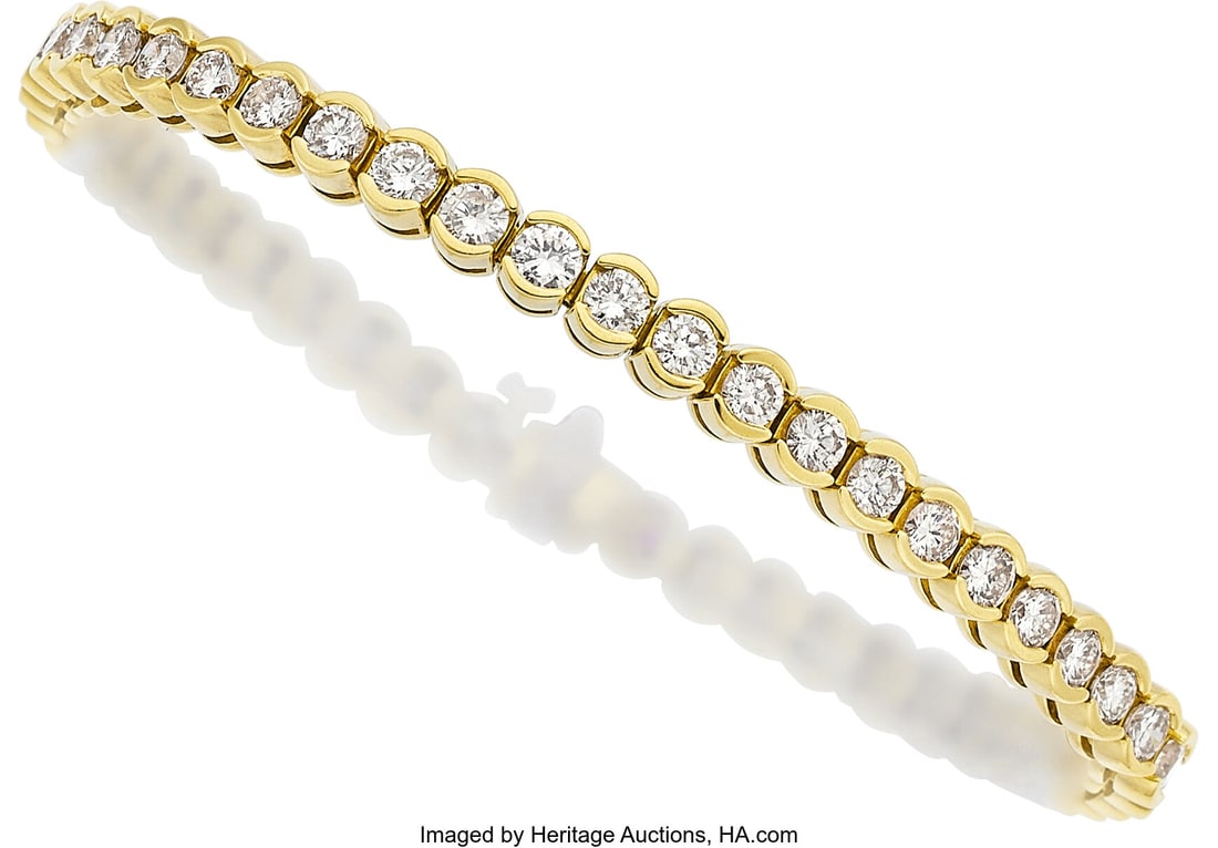 Roberto Coin Diamond, Gold Bracelet Stones: Ful: Roberto Coin Diamond, Gold Bracelet Stones: Full-cut diamonds weighing a total of 5.75 carats Metal: 18k gold Attributed: to Roberto Coin Gross Weight: 22.7