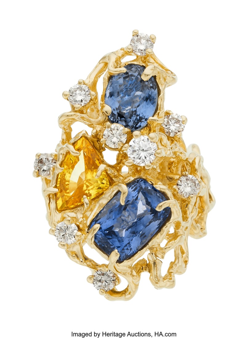 Yellow Sapphire, Tanzanite, Diamond, Gold Ring: Yellow Sapphire, Tanzanite, Diamond, Gold Ring Stones: Triangular-shaped yellow sapphire weighing approximately 1.75 carats; rectangular-shaped tanzanite weighing a