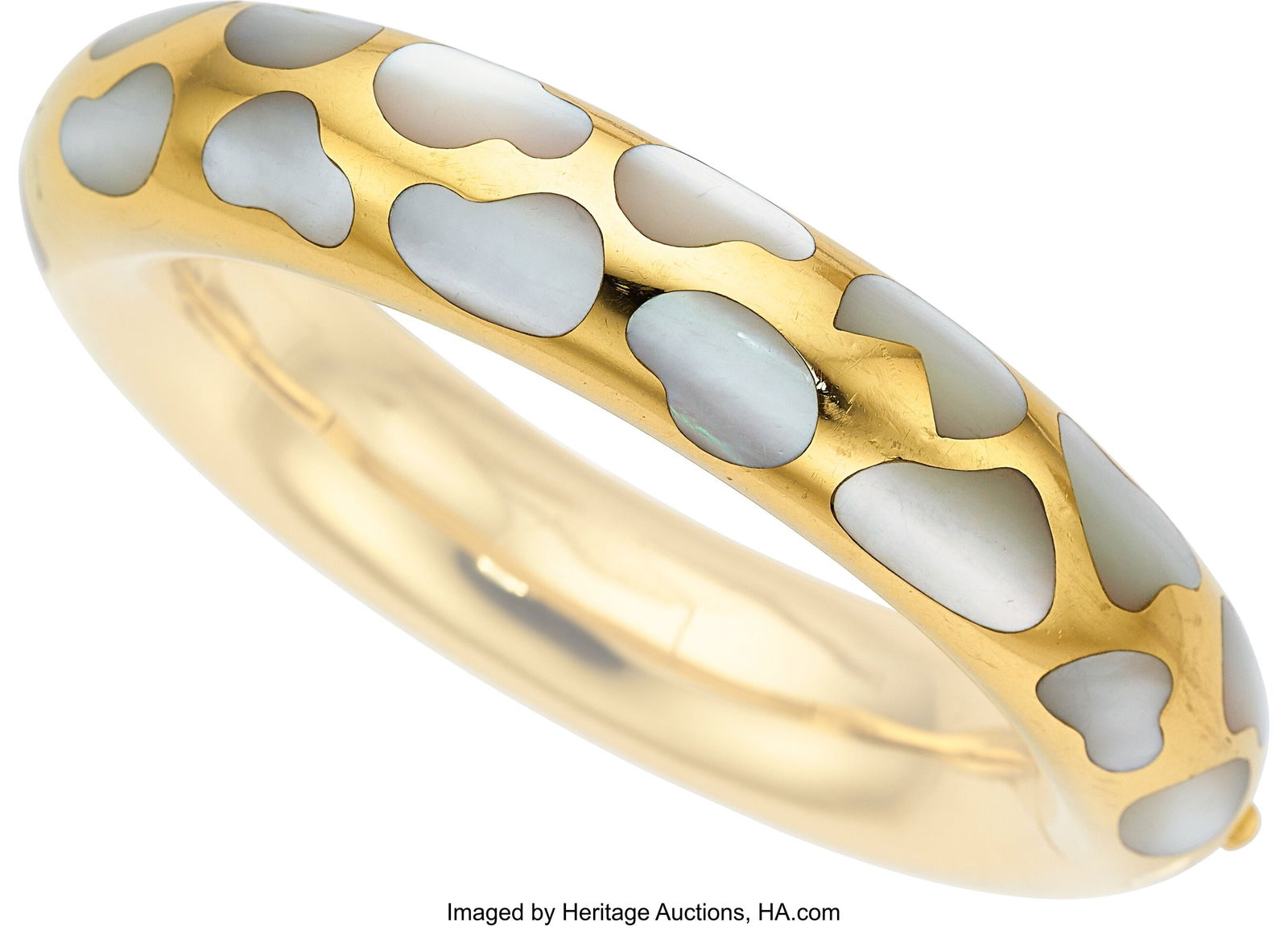 Angela Cummings for Tiffany & Co. Mother-of-Pea: Angela Cummings for Tiffany & Co. Mother-of-Pearl, Gold Bracelet Stones: Carved mother-of-pearl Metal: 18k gold Marked: Angela Cummings for Tiffany & Co.