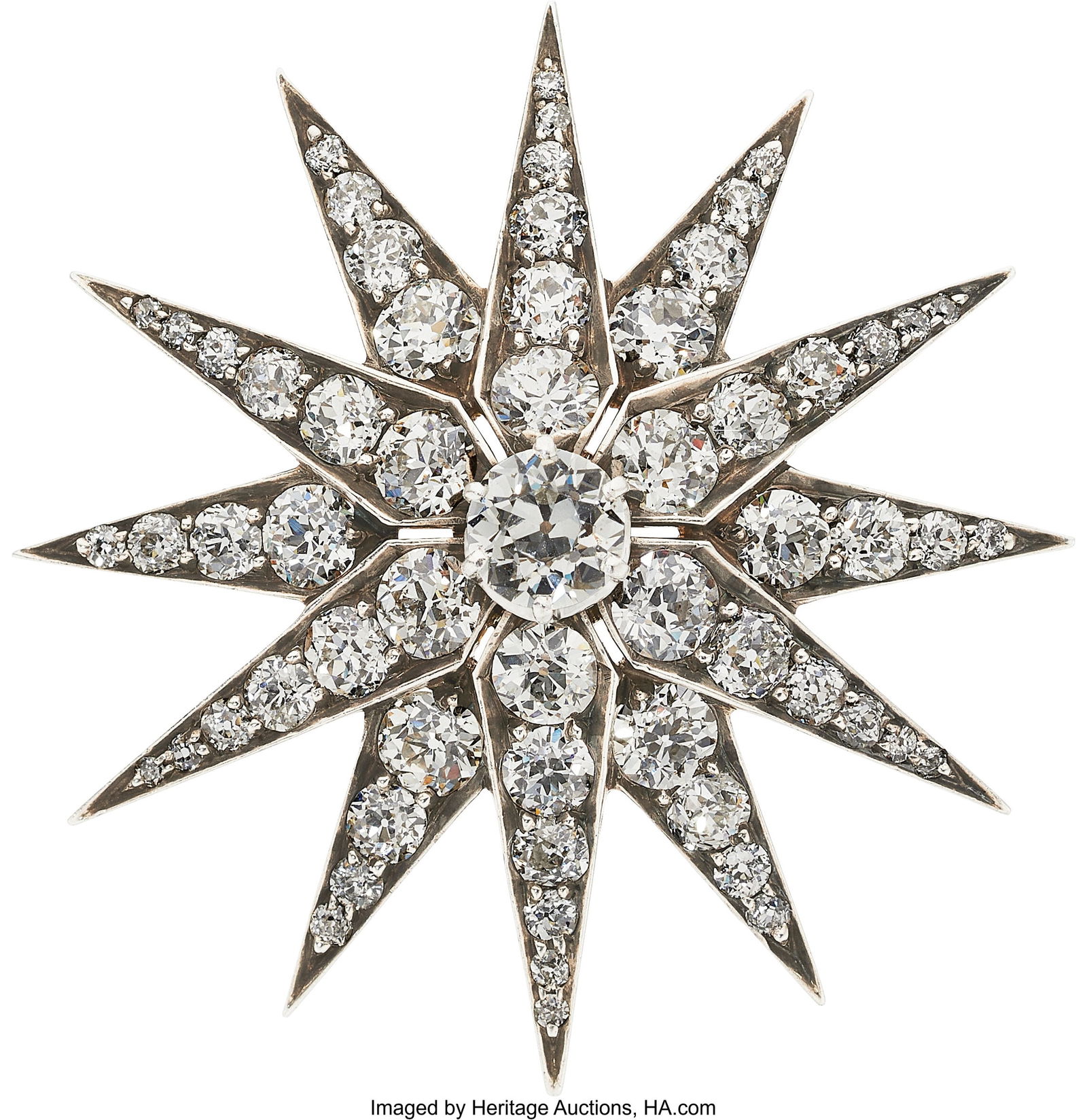 Tiffany & Co. Diamond, Gold, Silver-Topped Gold: Tiffany & Co. Diamond, Gold, Silver-Topped Gold Pendant-Brooch Stones: European-cut diamond weighing 0.90 carat; European-cut diamonds weighing a total of appr