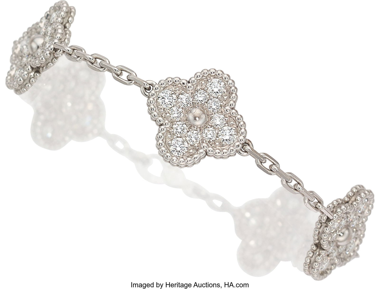 Van Cleef & Arpels Diamond, White Gold Bracelet: Van Cleef & Arpels Diamond, White Gold Bracelet, French Stones: Full-cut diamonds weighing a total of approximately 2.40 carats Metal: 18k white gold Marked: f