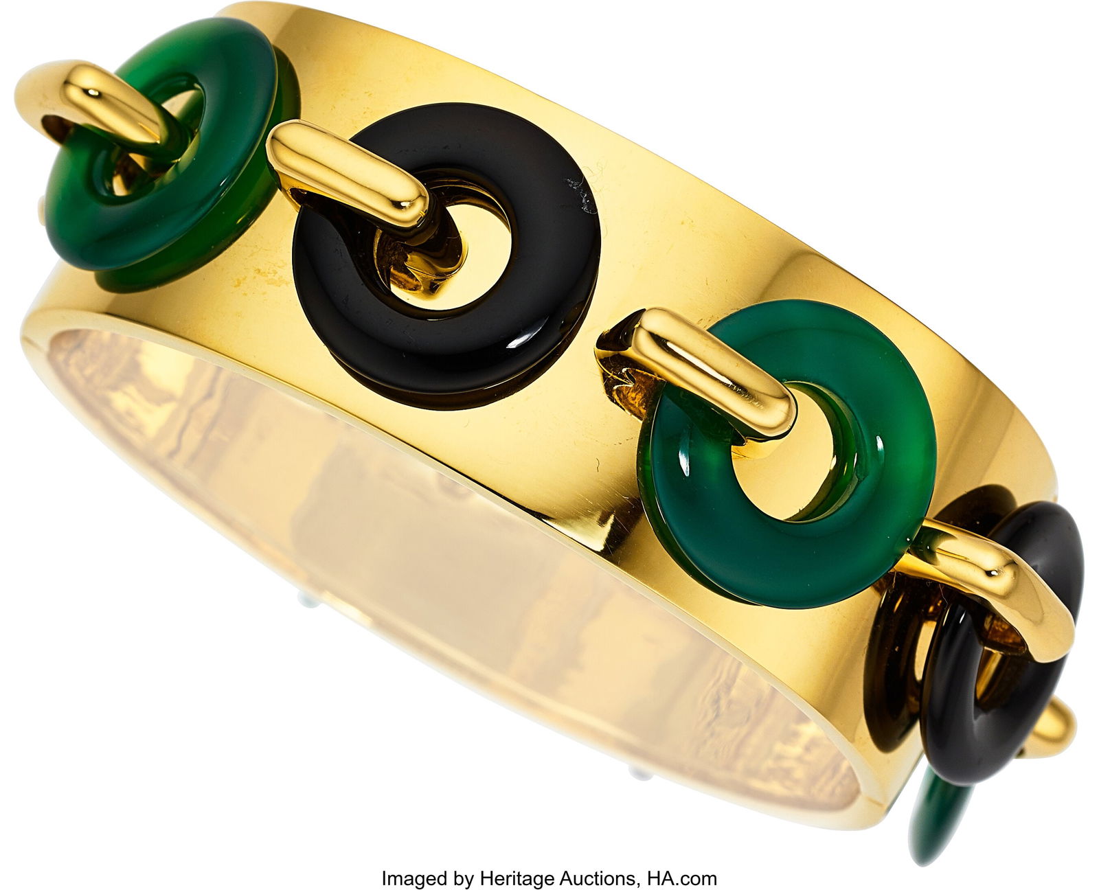 Aldo Cipullo Green Chalcedony, Black Onyx, Gold: Aldo Cipullo Green Chalcedony, Black Onyx, Gold Bracelet, circa 1983 Stones: Carved green chalcedony and black onyx Metal: 18k gold Marked: Aldo Cipullo Gross Weigh