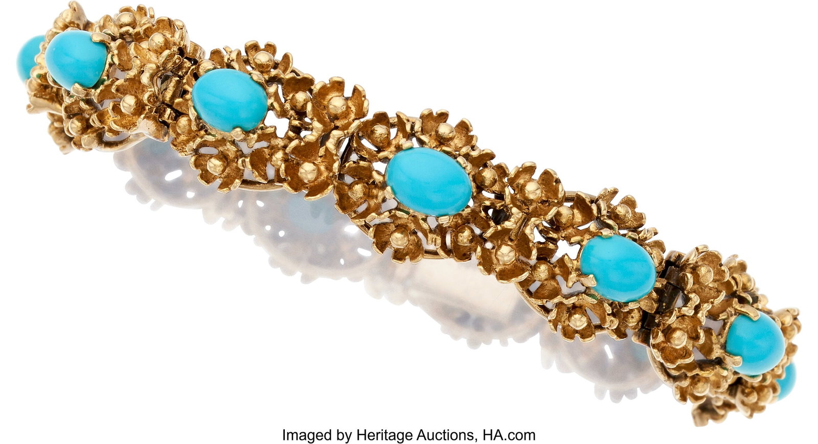 Composite Turquoise, Gold Bracelet Stones: Comp: Composite Turquoise, Gold Bracelet Stones: Composite turquoise cabochons Metal: 14k gold Gross Weight: 35.30 grams Dimensions: 7-1/8 inches x 1/2 inch &ast