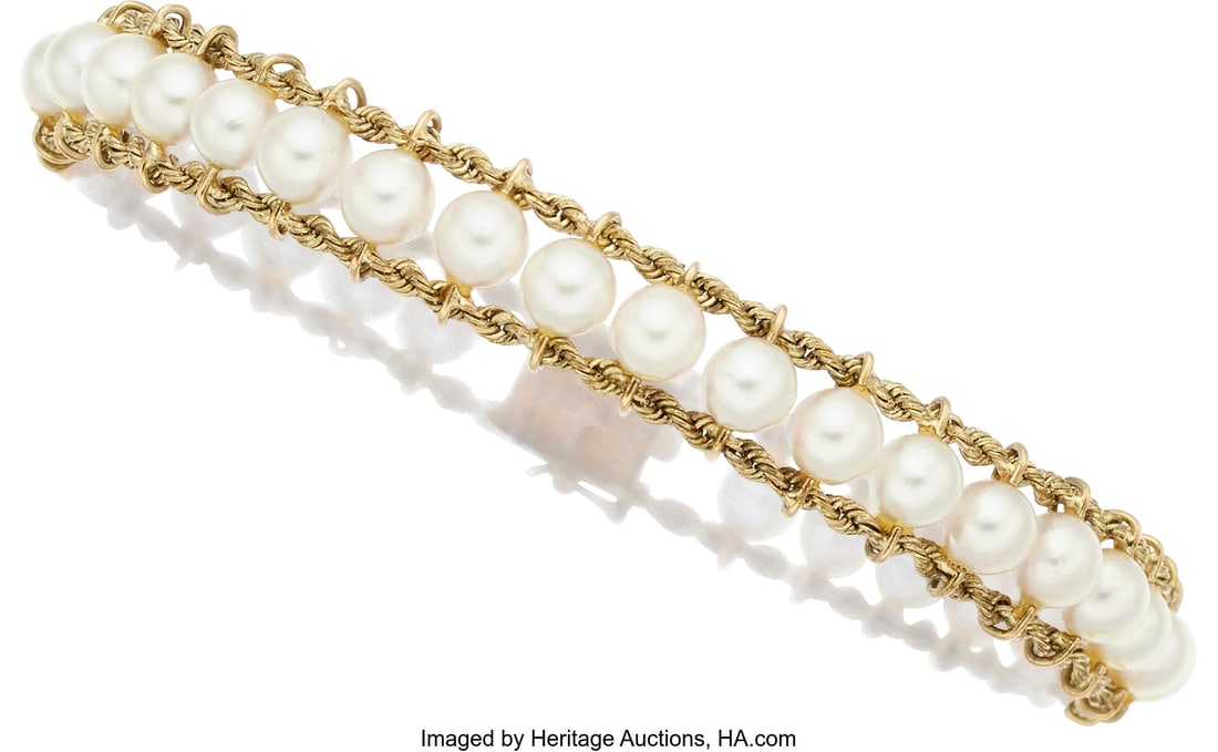 Cultured Pearl, Gold Bracelet Pearls: Cultured: Cultured Pearl, Gold Bracelet Pearls: Cultured peals measuring approximately 2.20 - 2.50 mm Metal: 14k gold Gross Weight: 12.20 grams Dimensions: 7-3