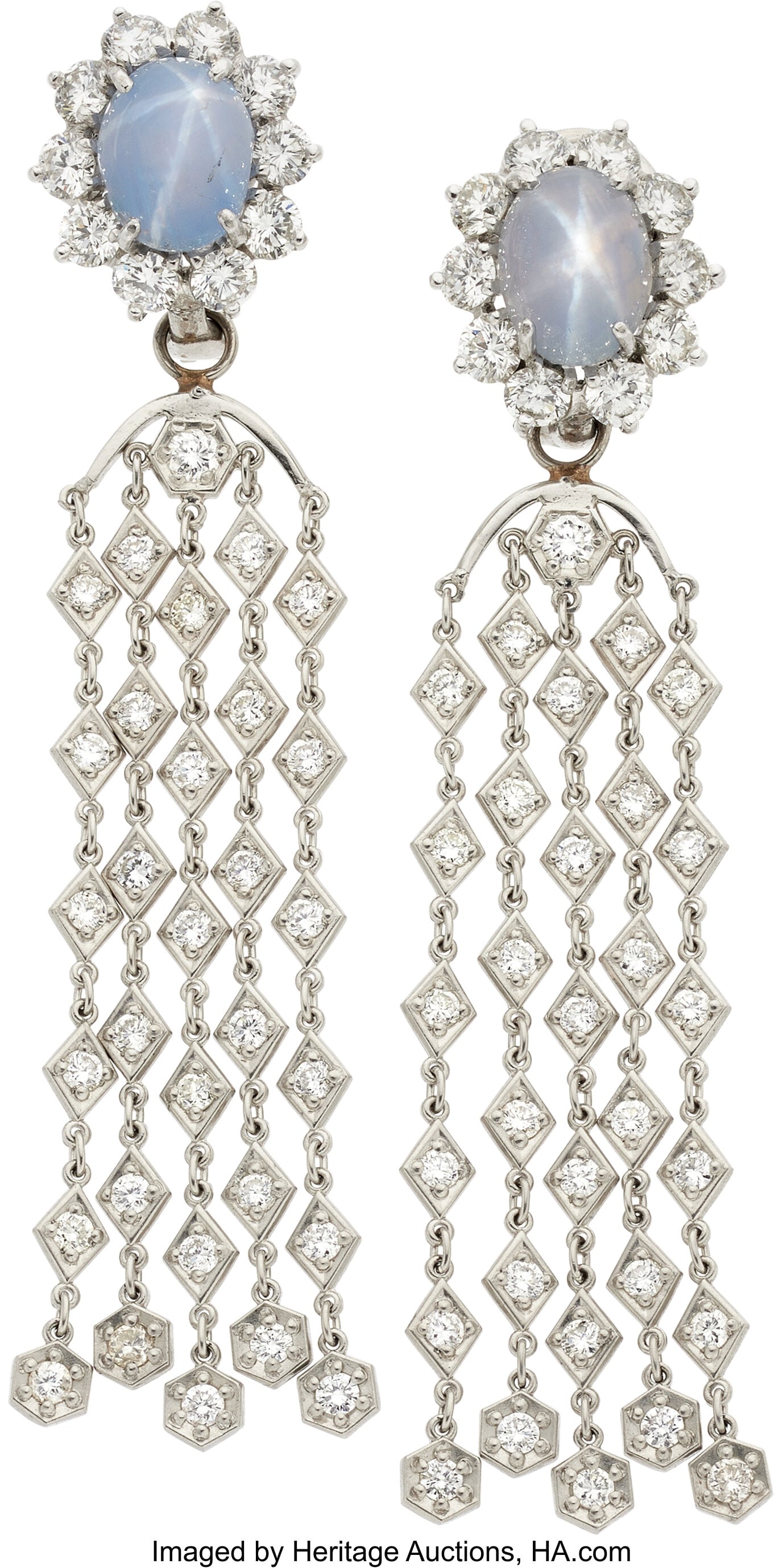 Star Sapphire, Diamond, Platinum, White Gold Ear: Star Sapphire, Diamond, Platinum, White Gold Earrings Stones: Star sapphire cabochons; full-cut diamonds weighing a total of approximately 3.50 carats Metal: