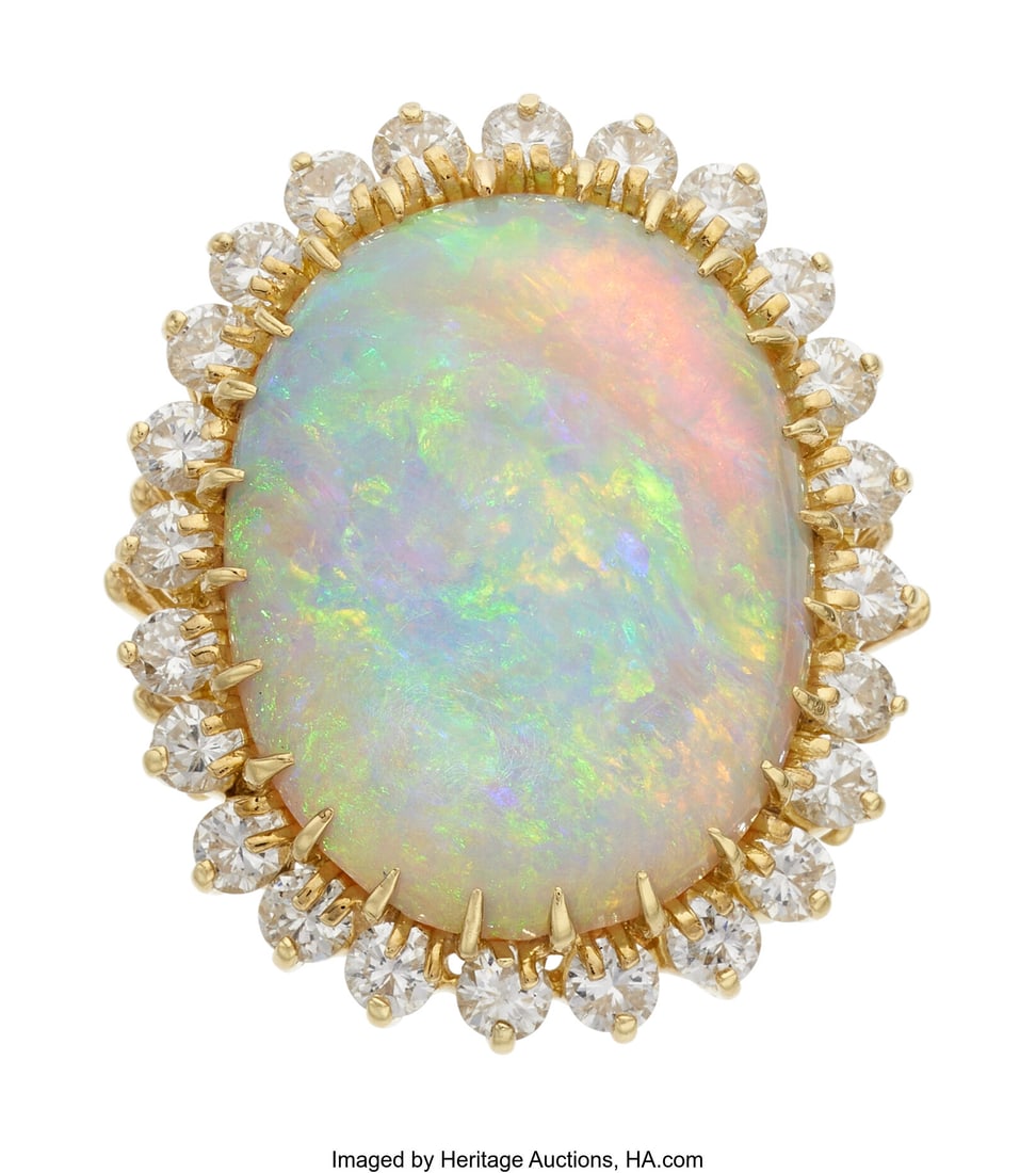 Opal, Diamond, Gold Ring Stones: Opal cabochon;: Opal, Diamond, Gold Ring Stones: Opal cabochon; full-cut diamonds weighing a total of approximately 1.50 carats Metal: 18k gold Gross Weight: 13.00 gra