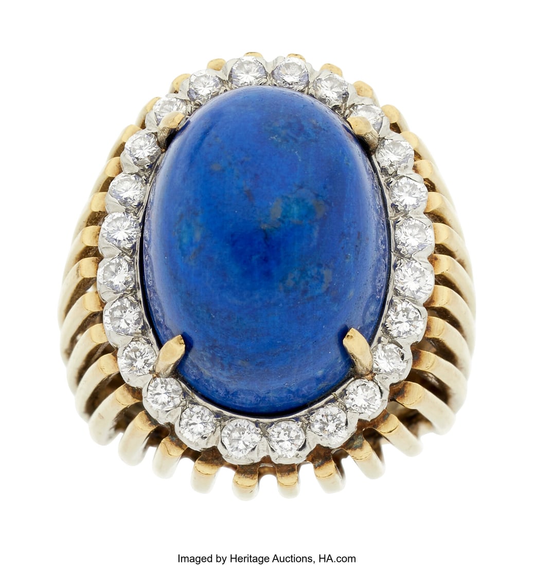 TURI Lapis Lazuli, Diamond, Platinum, Gold Ring: TURI Lapis Lazuli, Diamond, Platinum, Gold Ring Stones: Lapis lazuli cabochon; full-cut diamonds weighing a total of approximately 0.75 carat Metal: Platinum