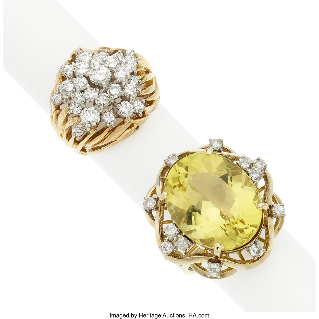 Citrine, Diamond, Gold Rings Stones: Oval-shape: Citrine, Diamond, Gold Rings Stones: Oval-shaped citrine; full-cut diamonds weighing a total of approximately 1.75 carats Metal: 18k and 14k gold Gross Weight&colon