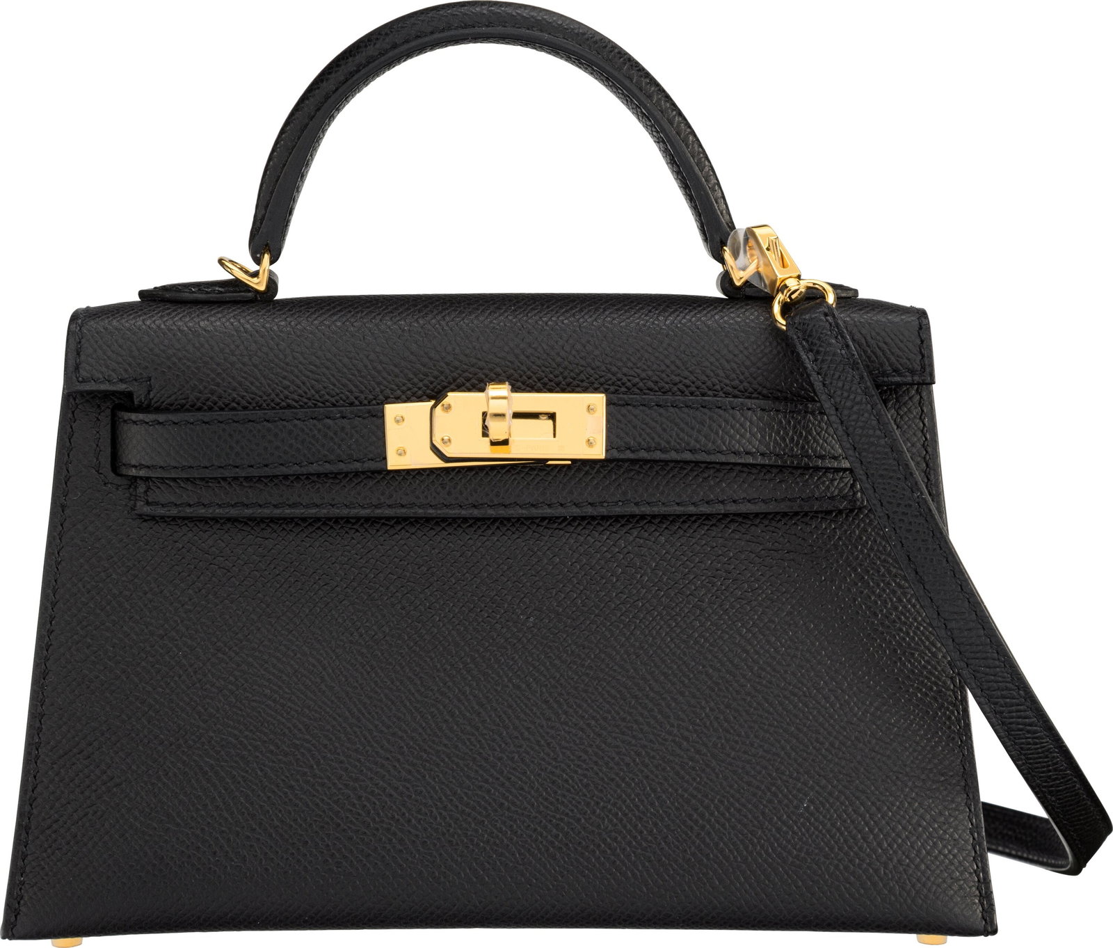 Hermès 20cm Black Epsom Leather Mini Kelly with: Hermès 20cm Black Epsom Leather Mini Kelly with Gold Hardware W, 2024 Condition: 1 7.5" Width x 4.5" Height x 2.5" Depth This bag is done in Black Epsom Leather