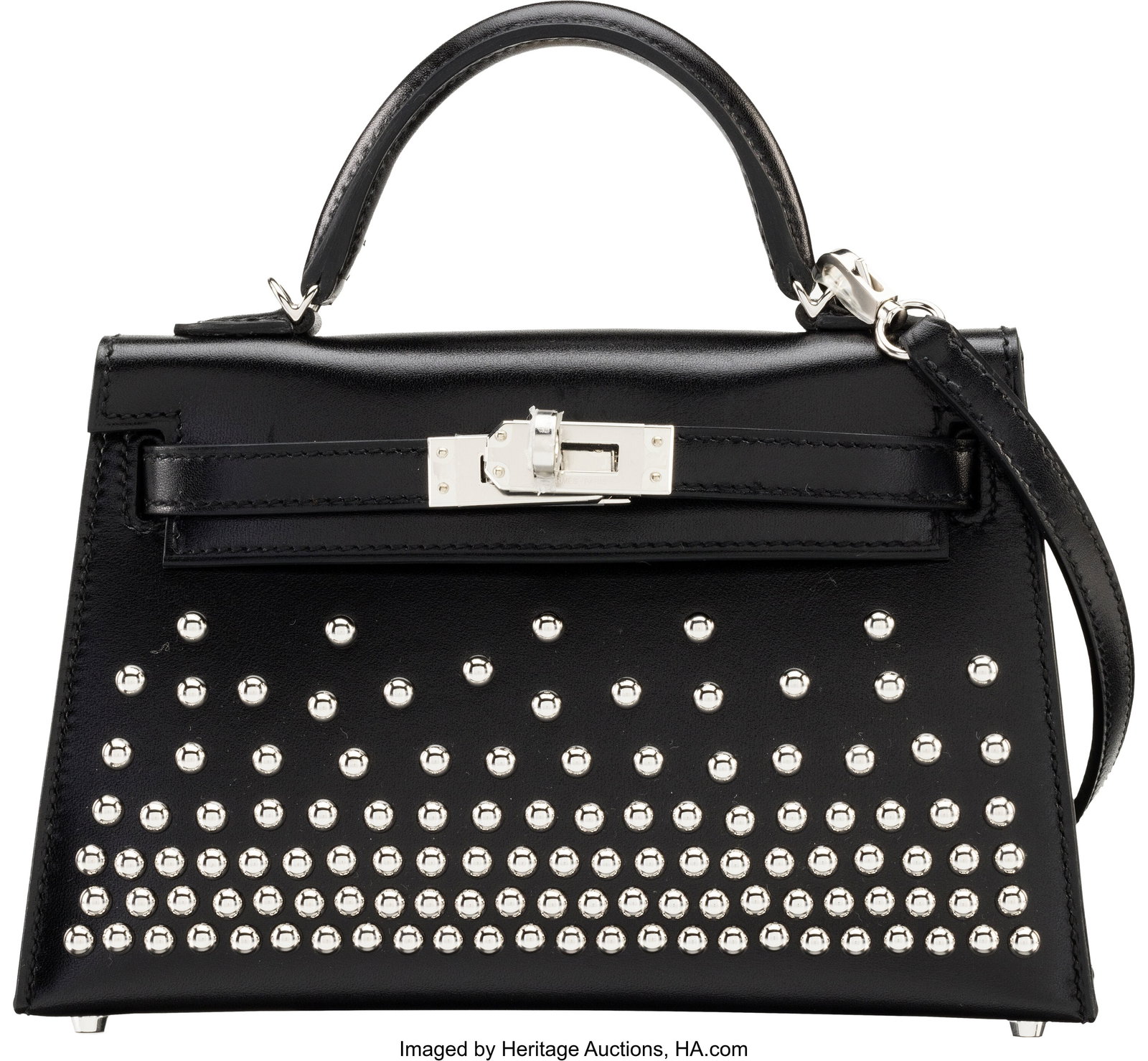 Hermès 20cm Black Box Calf Leather Cloutè Mini: Hermès 20cm Black Box Calf Leather Cloutè Mini Kelly with Palladium Hardware W, 2024 Condition: 1 7.5" Width x 5" Height x 2.25" Depth This bag is done in Black