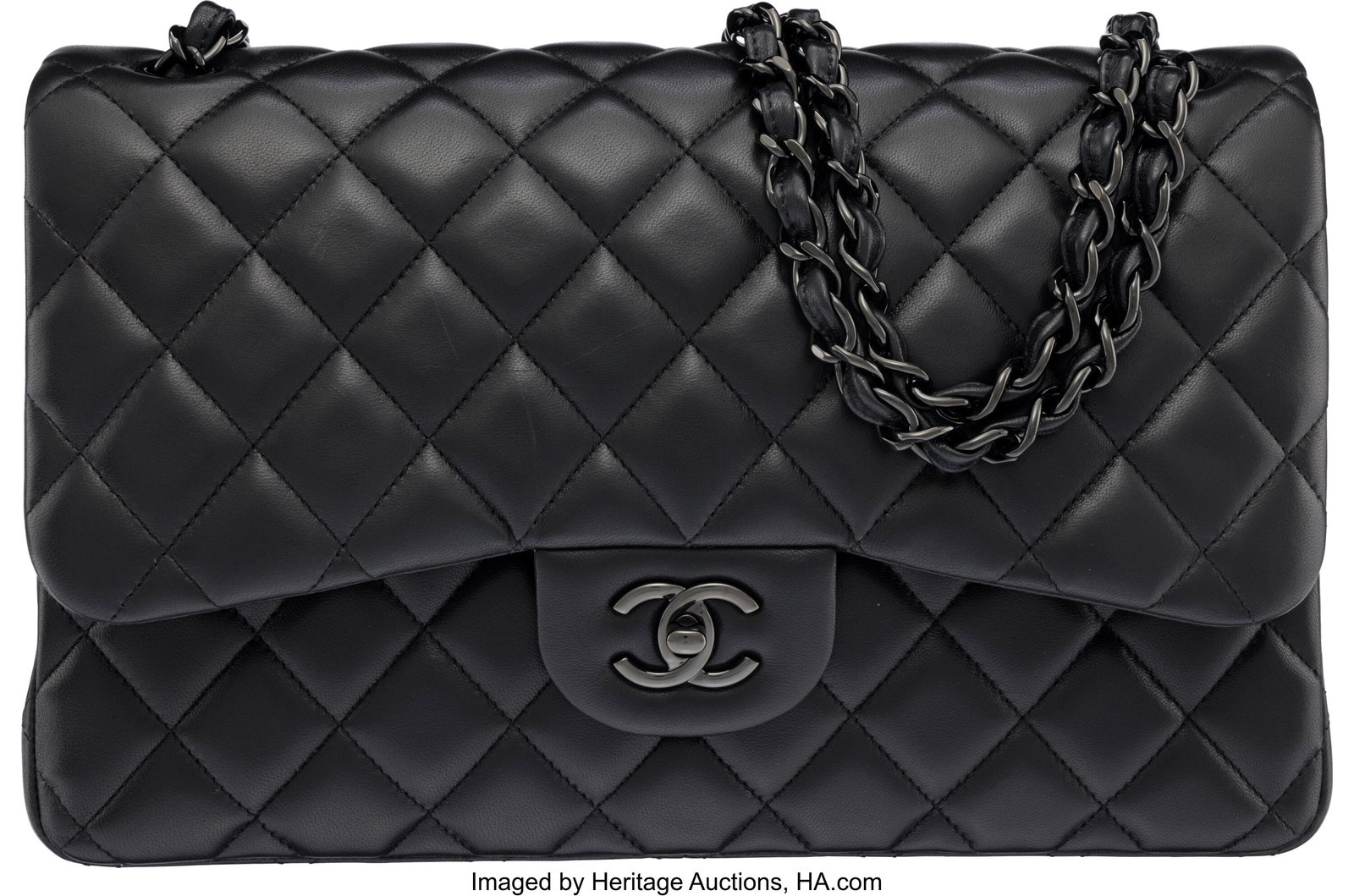 Chanel So Black Quilted Lambskin Leather Jumbo C: Chanel So Black Quilted Lambskin Leather Jumbo Classic Double Flap Bag with Black Hardware Condition: 2 12" Width x 7.5" Height x 3.5" Depth This bag is done in Black Quilted Lambs