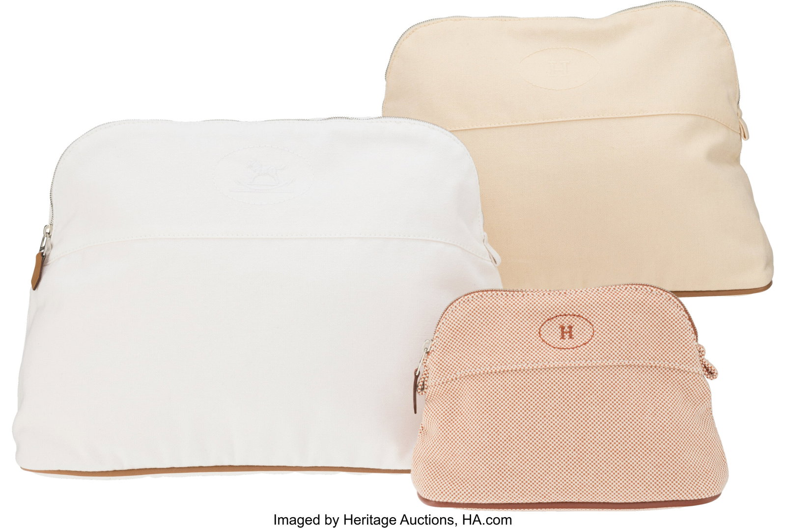 Hermès Set of Three: Toile Canvas Bolide Cases: Hermès Set of Three: Toile Canvas Bolide Cases See Extended Condition Report for Details. This set includes: Hermès Orange Toile Mini Bolide Case with Palladium Hardwa