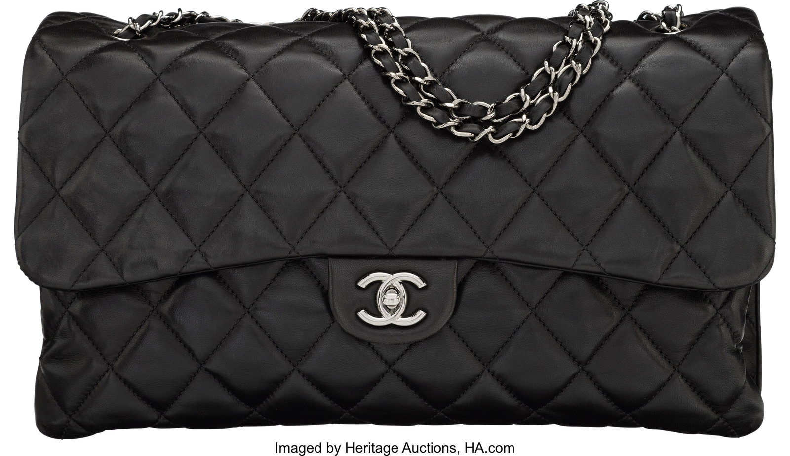 Chanel Black Quilted Lambskin Leather Jumbo Acco: Chanel Black Quilted Lambskin Leather Jumbo Accordion Flap Bag with Silver Hardware 2011 Condition: 2 14" Width x 8" Height x 4" Depth This bag is done in Black Lambskin Leather with Silver Hard