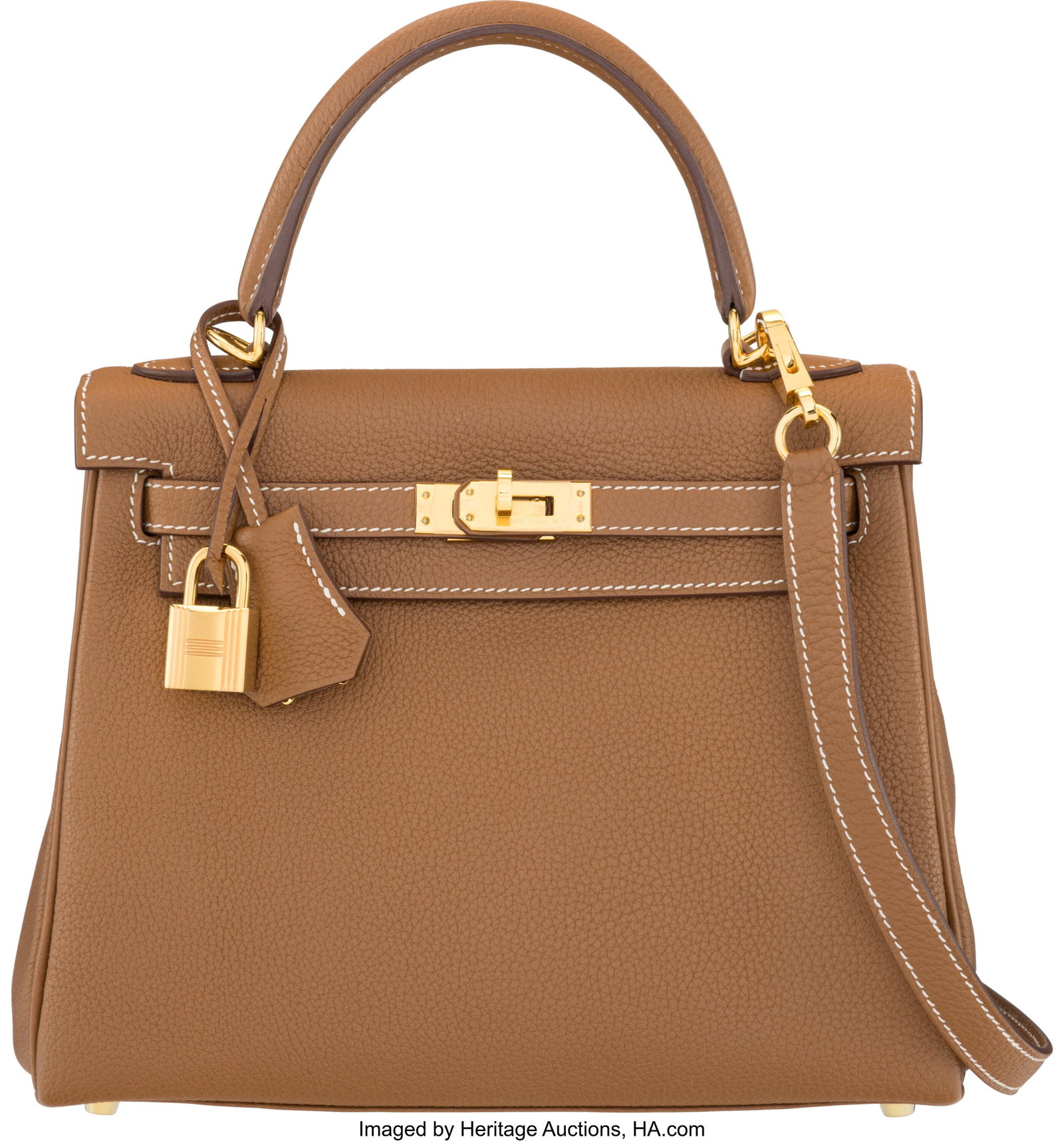 Hermès 25cm Gold Togo Leather Kelly Retourne Ba: Hermès 25cm Gold Togo Leather Kelly Retourne Bag with Gold Hardware U, 2022 Condition: 2 9" Width x 7.5" Height x 4" Depth This bag is done in Gold Togo Leather with Palladiu