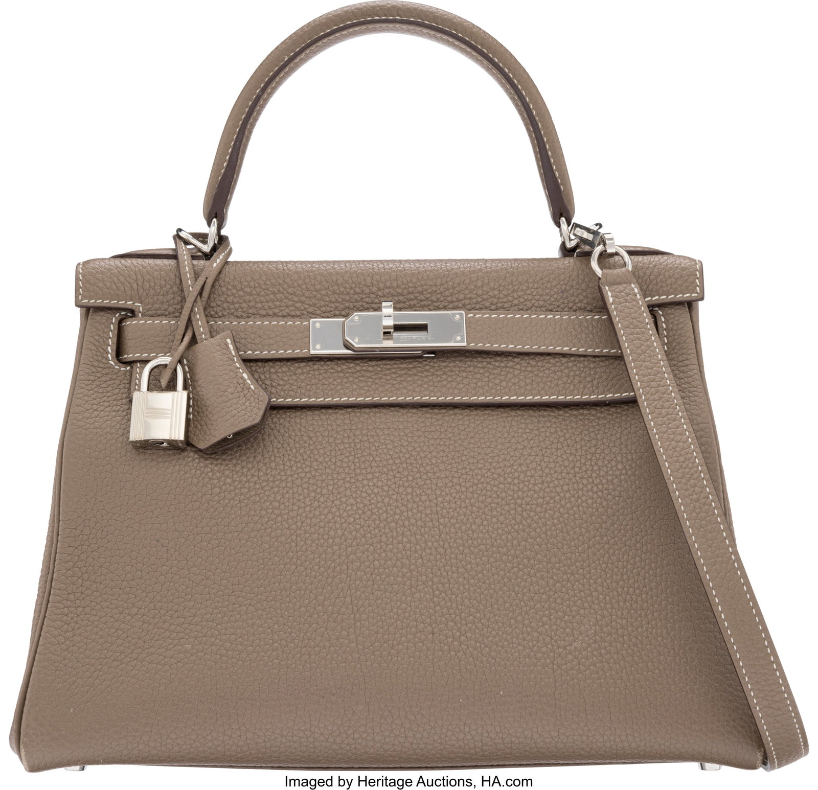 Hermès 28cm Etoupe Togo Leather Kelly Retourne: Hermès 28cm Etoupe Togo Leather Kelly Retourne Bag with Palladium Hardware U, 2022 Condition: 3 10" Width x 7.5" Height x 3.5" Depth This bag is done in Etoupe Togo Le