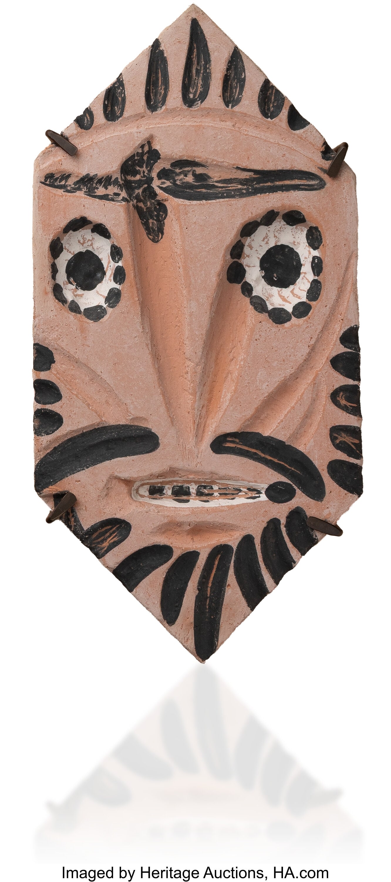 Pablo Picasso (1881-1973) Losange au masque (A.R: Pablo Picasso (1881-1973) Losange au masque (A.R. 345), 1956 Chamotted red earthenware clay, decoration in engobes 15-3/4 x 8 x 1-1/2 inches &lpar