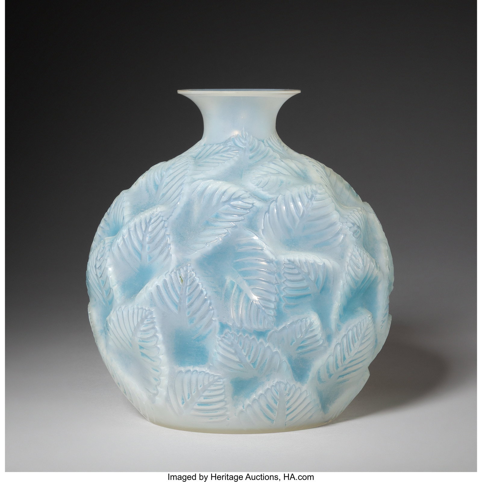 René Lalique Ormeaux Vase, circa 1926 Opalesce: René Lalique Ormeaux Vase, circa 1926 Opalescent glass with blue patina 6-5/8 inches (16.8 cm), M.p. 435, no. 984. Marks&colon