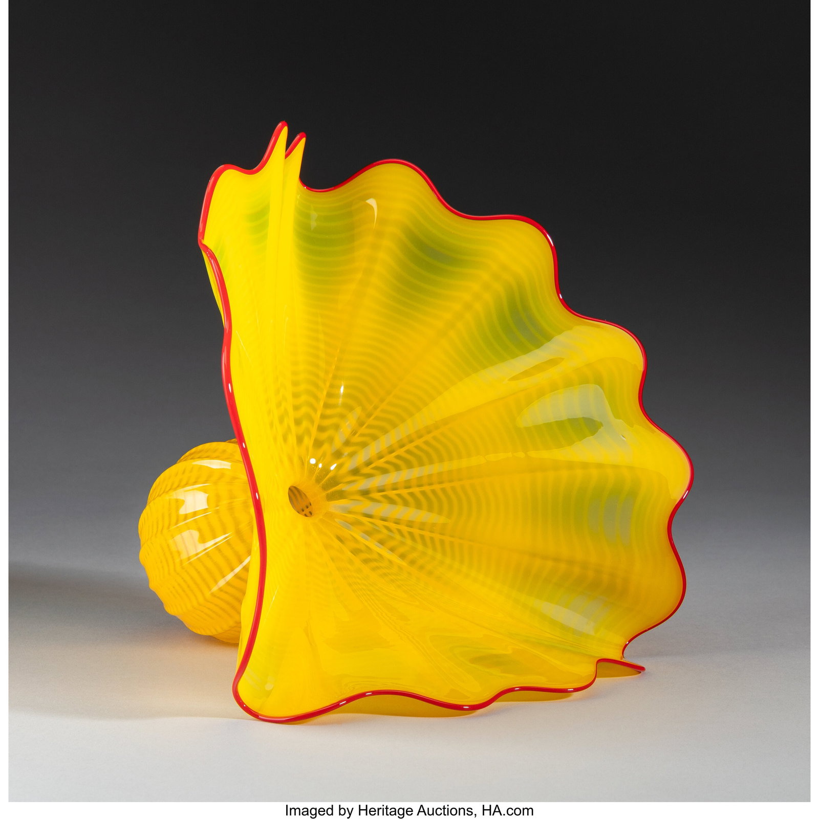 Dale Chihuly Buttercup Persian Blown glass 8-3/4: Dale Chihuly Buttercup Persian Blown glass 8-3/4 x 12 x 9-3/4 inches (22.2 x 30.5 x 24.8 cm) Etched to side: Chihuly This lot is accompanied by a Persians