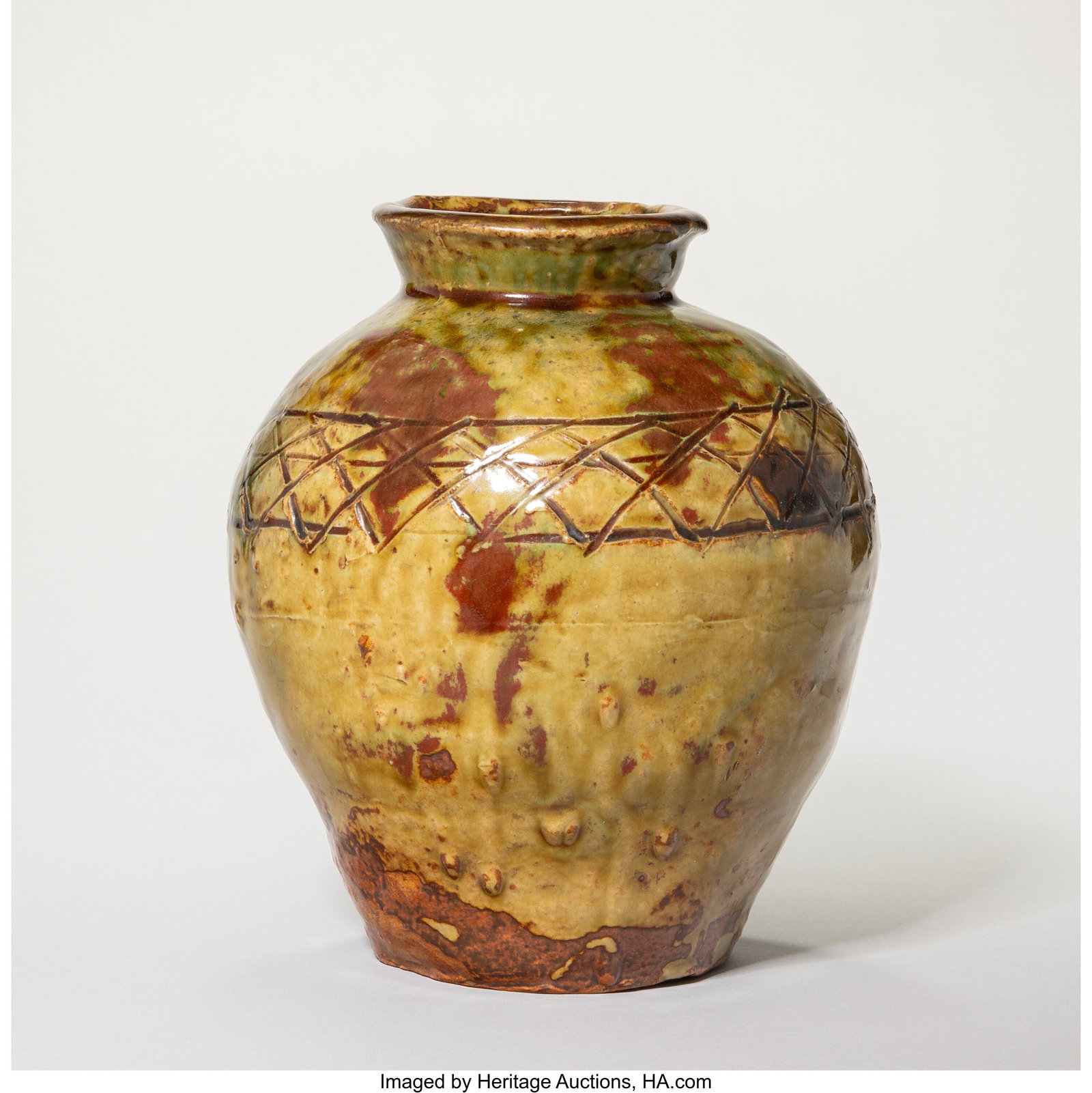 Kitaoji Rosanjin Oribe-Style Jar, early 20th cen: Kitaoji Rosanjin Oribe-Style Jar, early 20th century Glazed stoneware 8-1/4 x 7 inches (21.0 x 17.8 cm) Incised artist mark HID03101062020 © 2026 Heritage Auctio