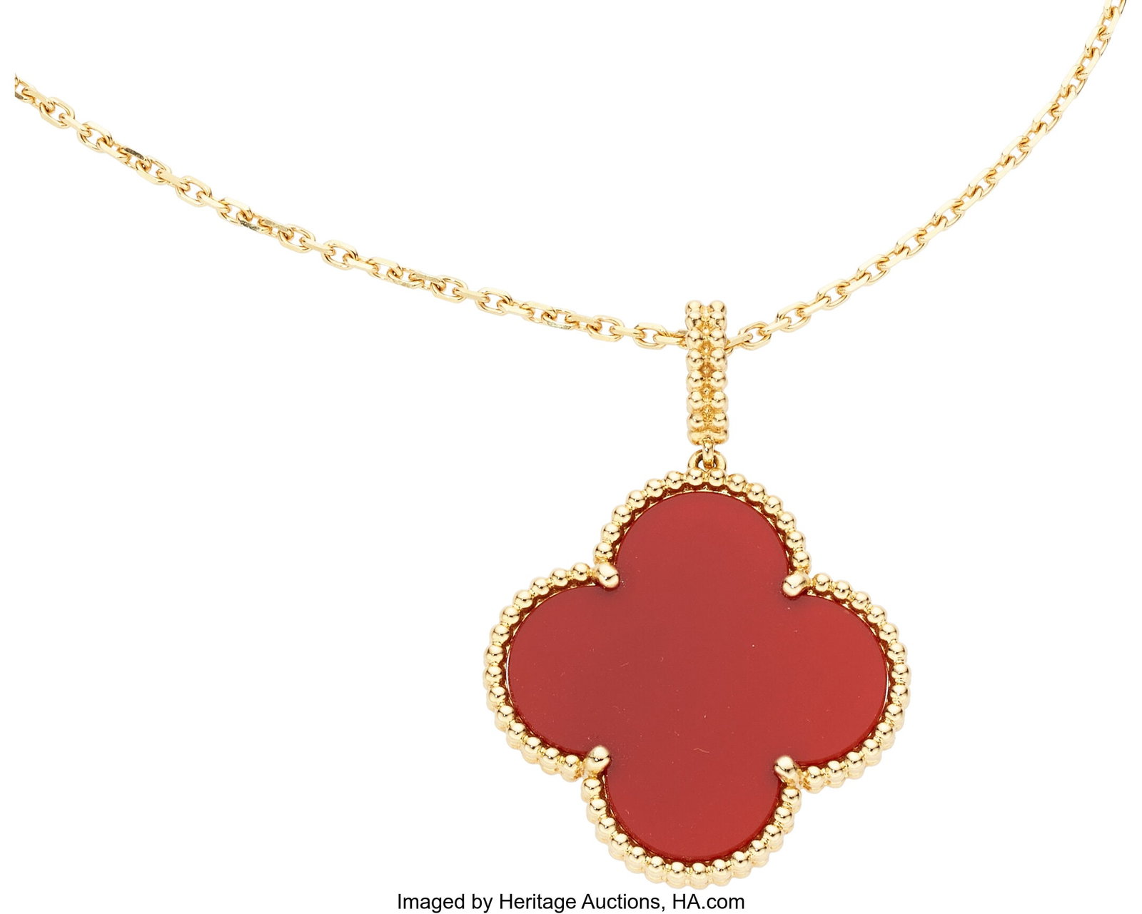 Van Cleef & Arpels Carnelian, Gold Pendant-Neckl: Van Cleef & Arpels Carnelian, Gold Pendant-Necklace, French Stones: Carved carnelian Metal: 18k gold Marked VCA; French hallmarks Collection: Magic Alhambra Gros