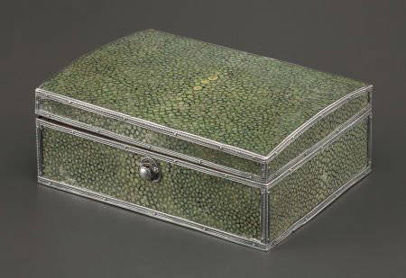 A JOHN PAUL COOPER GEORGE V SILVER MOUNTED SHAGR: A JOHN PAUL COOPER GEORGE V SILVER MOUNTED SHAGREEN CIGARETTE BOX John Paul Cooper, (British, 1869-1933), circa 19302 x 5-1/8 x 3-7/8 inches (5.1 x 13.0 x 9.8 cm) The rectangular