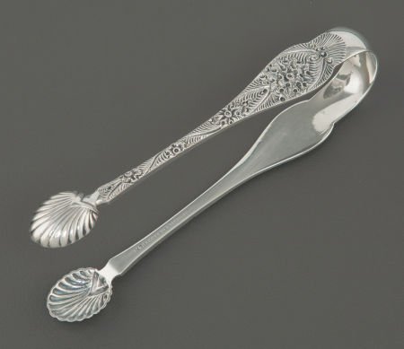 A PAIR OF TIFFANY & CO. CUSTOM ENGRAVED PATTERN : A PAIR OF TIFFANY & CO. CUSTOM ENGRAVED PATTERN SILVER SUGAR TON