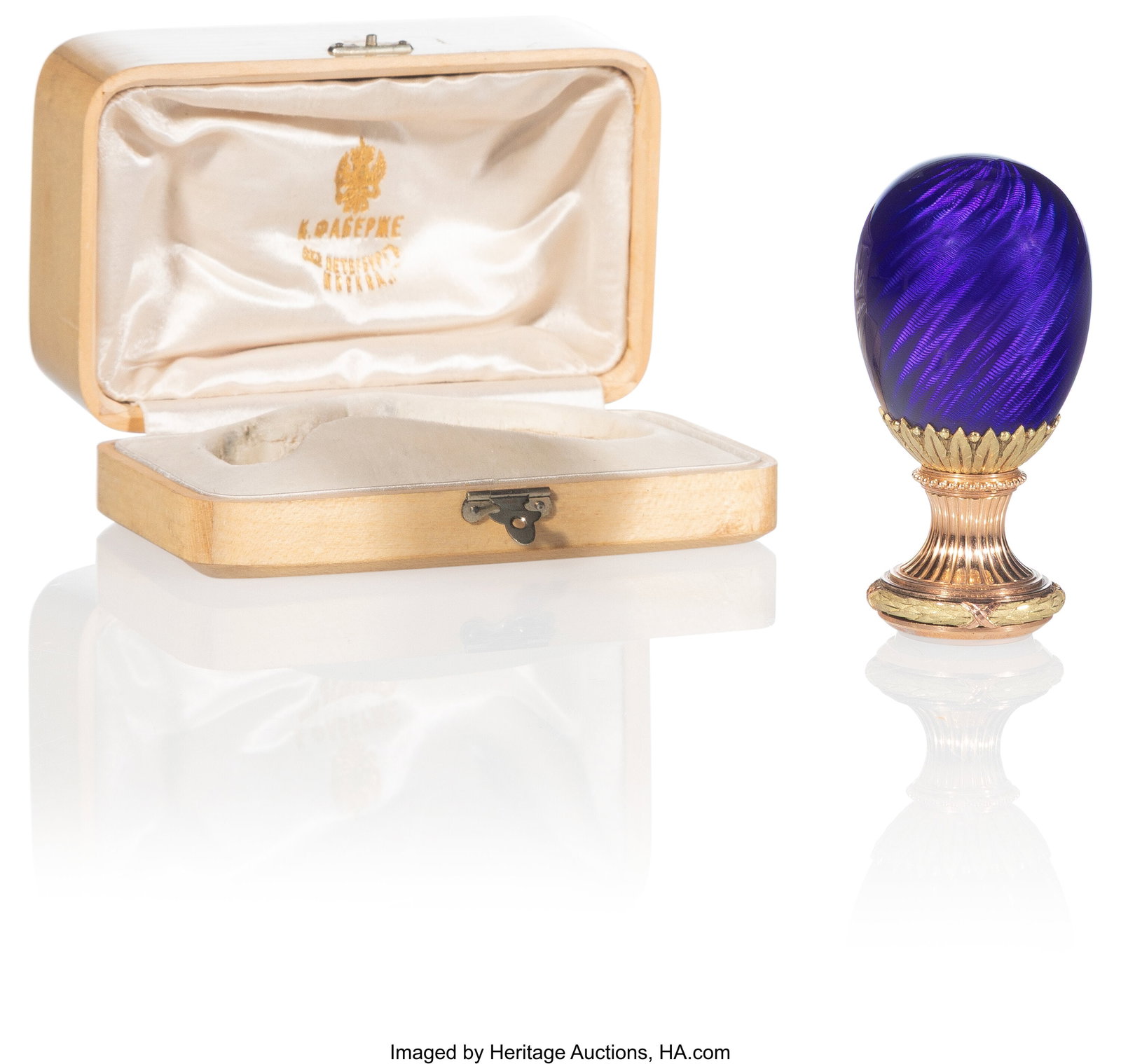 A Baden Grand Ducal Fabergé Cobalt Blue Guilloc: A Baden Grand Ducal Fabergé Cobalt Blue Guilloché Enameled Two-Color Gold Egg-Shaped Desk Seal Fabergé, Workmaster Mikhail Perkhin, St. Petersburg, circa 