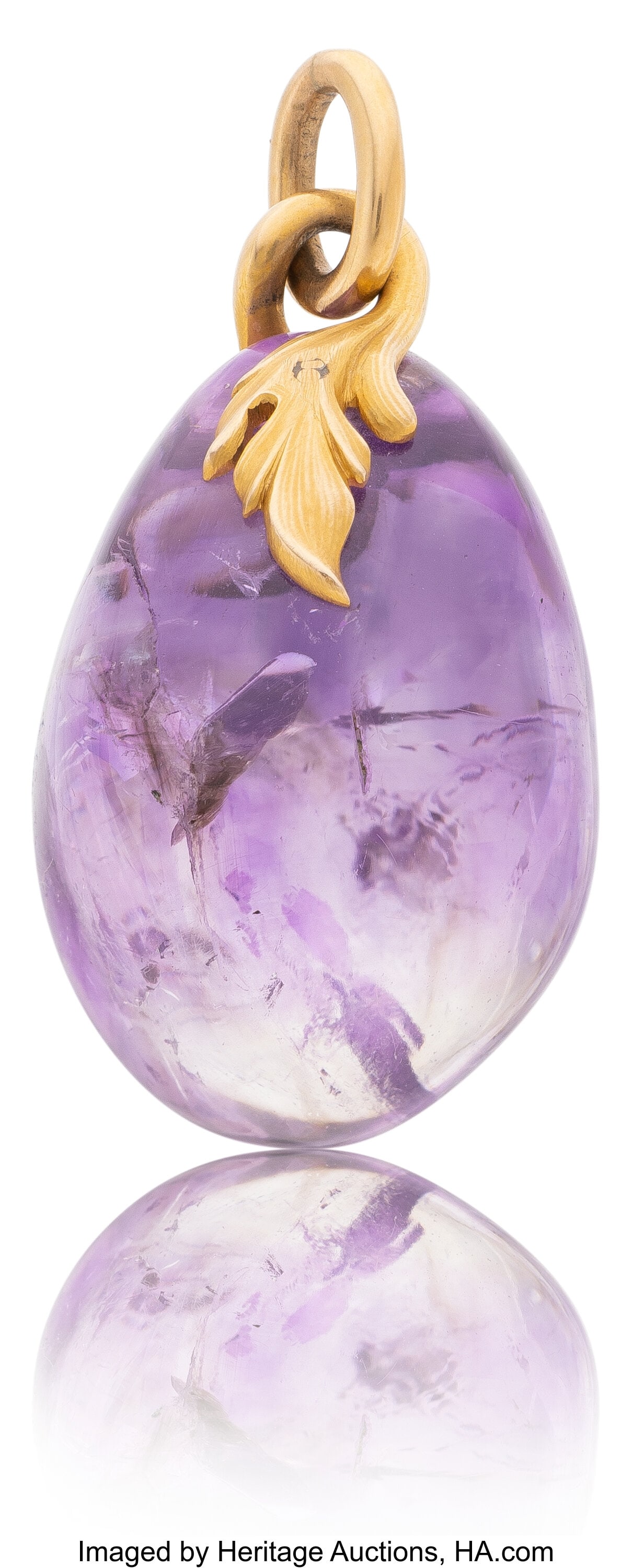 A Baden Grand Ducal Fabergé Amethyst Pendant wi: A Baden Grand Ducal Fabergé Amethyst Pendant with Leaf-Form Gold Mount Fabergé, Workmaster A. Hollming, St. Petersburg, 1908-1917 1-1/2 x 0-3/4 in