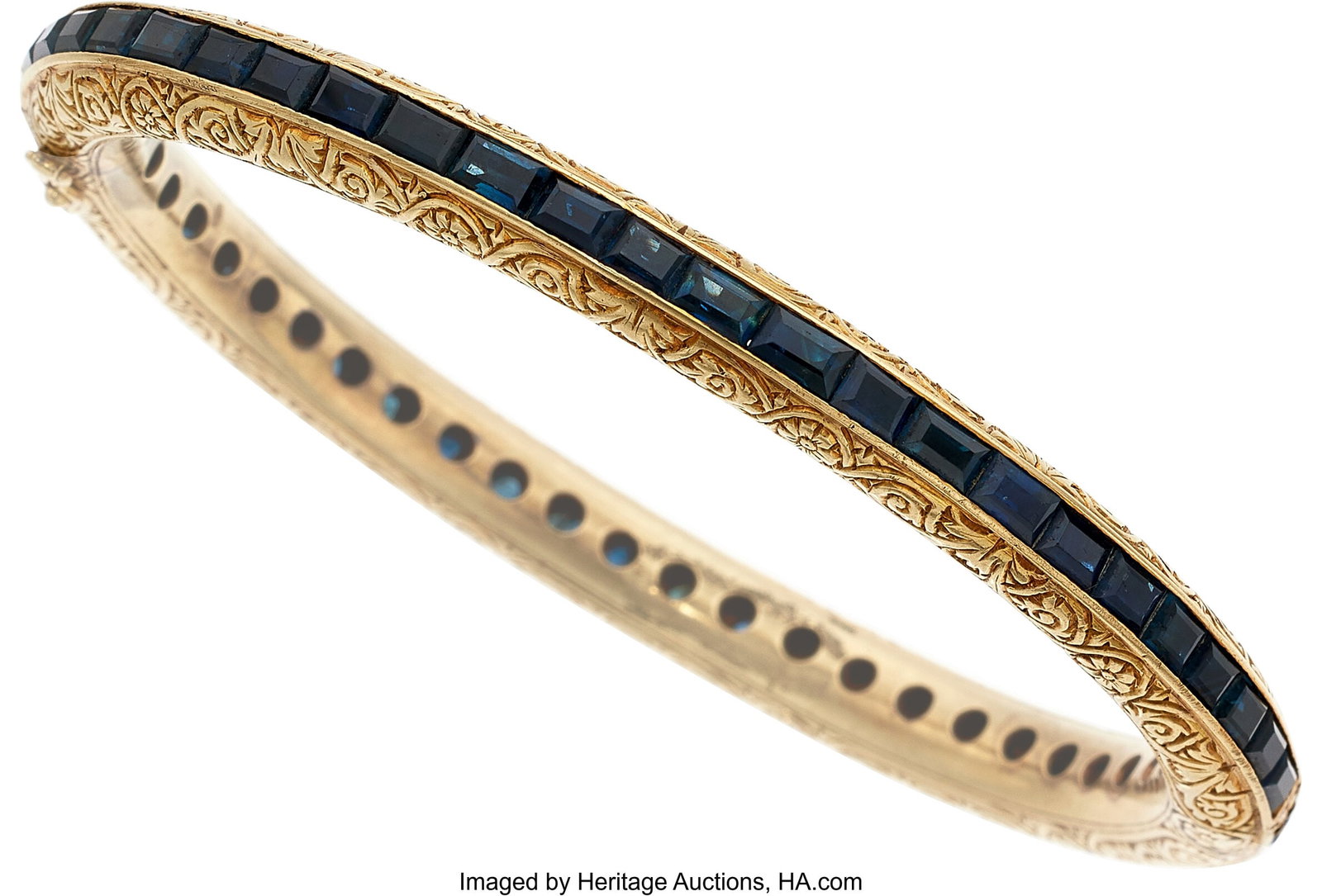 Sapphire, Gold Bracelet Stones: Rectangular-sha: Sapphire, Gold Bracelet Stones: Rectangular-shaped sapphires weighing a total of approximately 12.50 carats Metal: 18k gold Gross Weight: 27.70 grams Dimensions&c