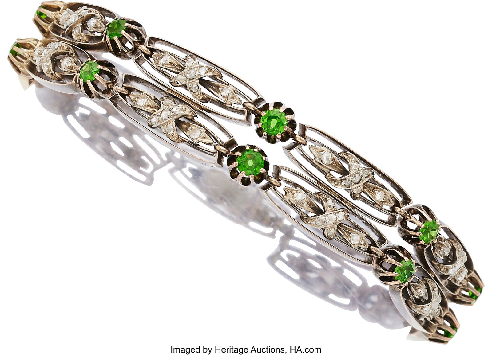 Antique Demantoid Garnet, Diamond, Gold, Silver : Antique Demantoid Garnet, Diamond, Gold, Silver Bracelet Stones Round-shaped demantoid garnets weighing a total of approximately 1.15 carats; round-shaped grossular garne