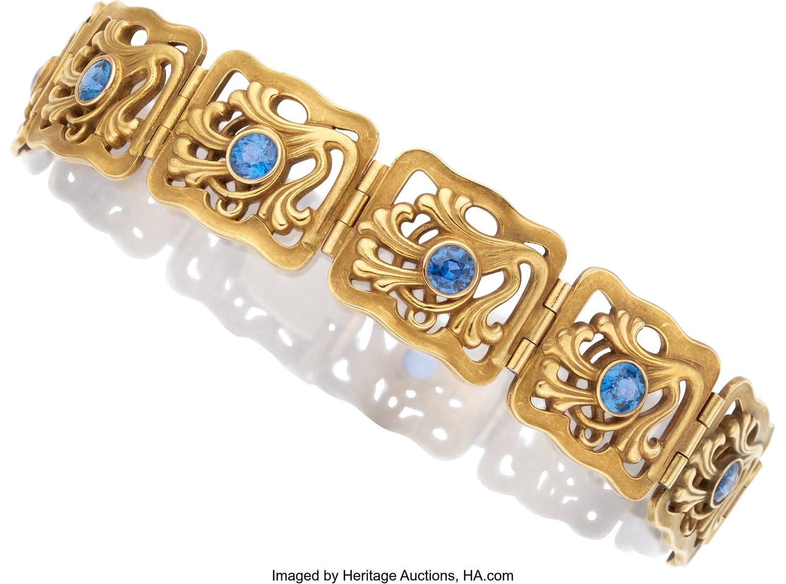 Riker Bros. Art Nouveau Sapphire, Gold Bracelet : Riker Bros. Art Nouveau Sapphire, Gold Bracelet Stones: Round-cut blue sapphires weighing a total of approximately 4.00 carats Metal: 14k gold Gross Weight: 35&pe