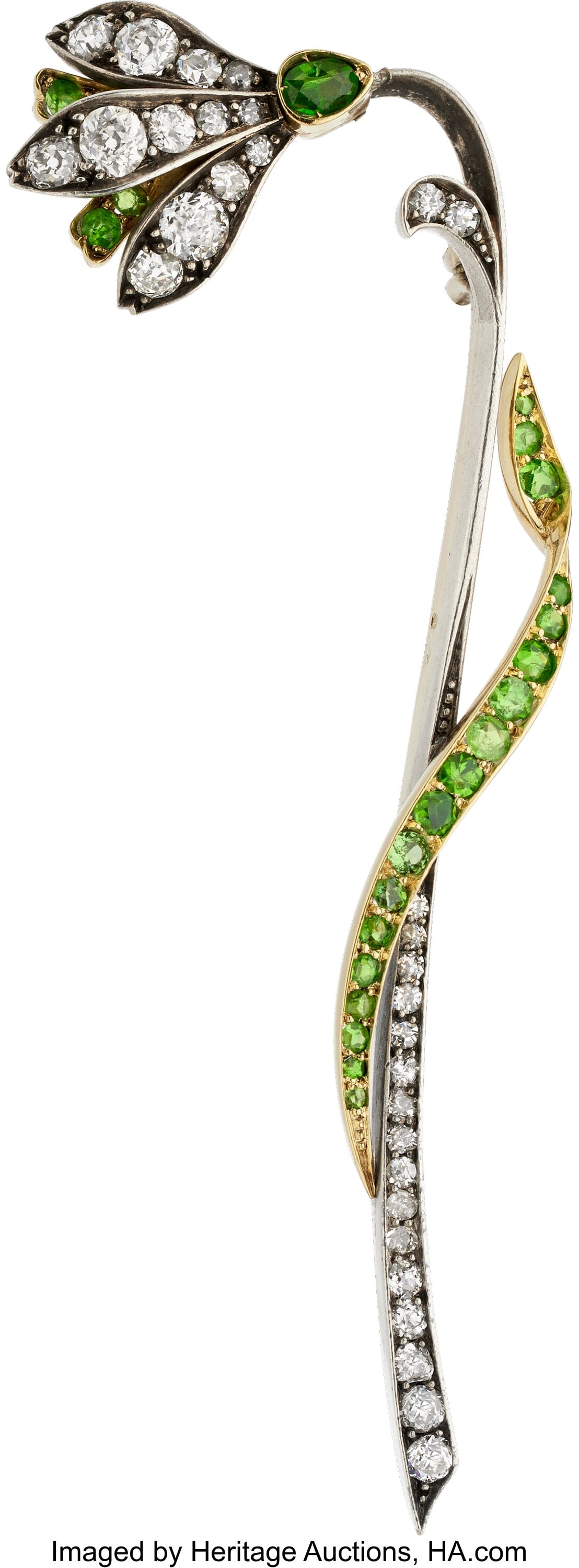 Diamond, Demantoid Garnet, Gold, Silver-Topped G: Diamond, Demantoid Garnet, Gold, Silver-Topped Gold Brooch, Hungary, early 20th century Stones: Mine and single-cut diamonds weighing a total of approximately 1&per