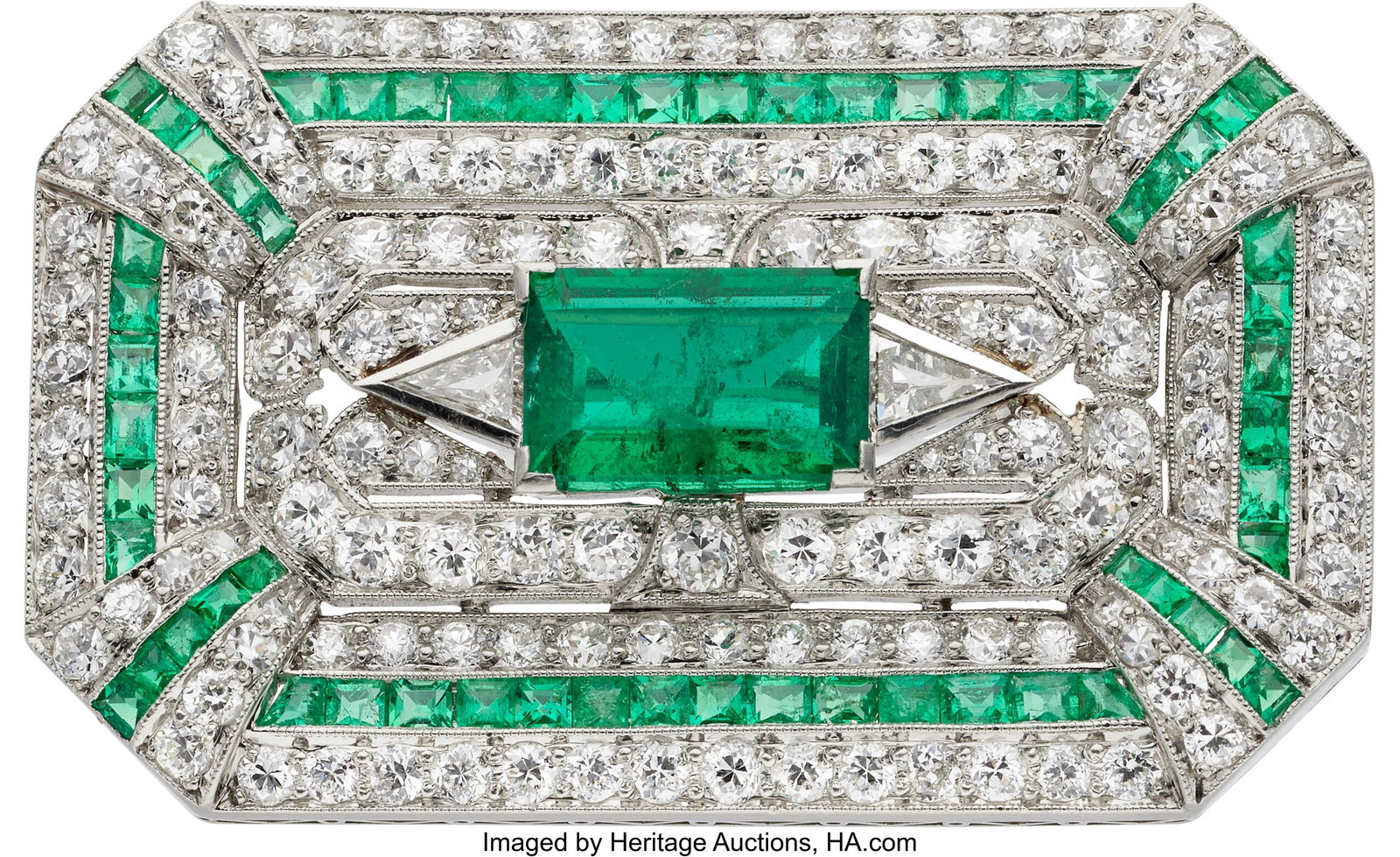 Art Deco Emerald, Diamond, Platinum Pendant-Broo: Art Deco Emerald, Diamond, Platinum Pendant-Brooch Stones: Rectangular-cut emerald weighing approximately 1.45 carats, calibré-cut emeralds; European, 
