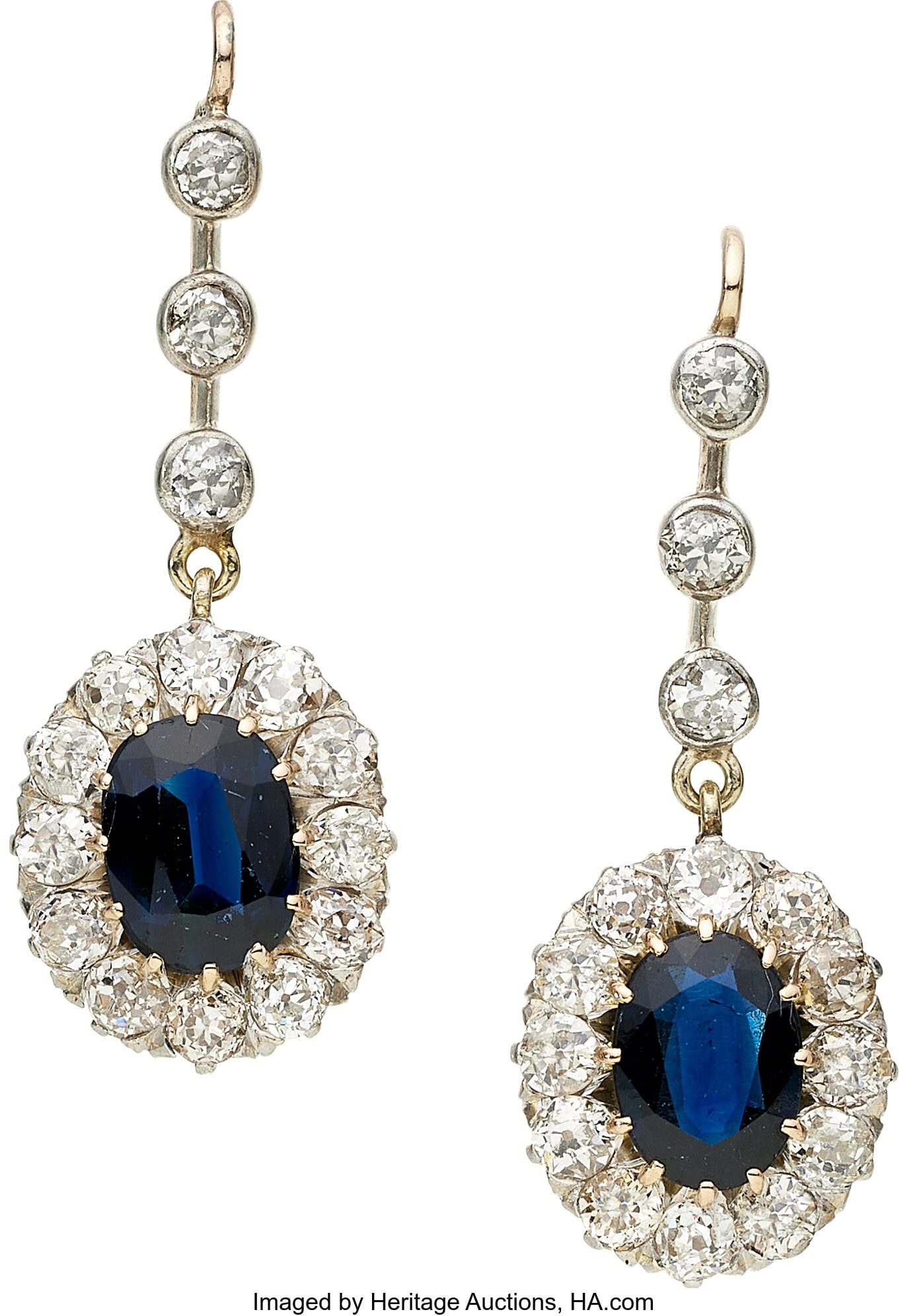 Sapphire, Diamond, Platinum, Gold Earrings Ston: Sapphire, Diamond, Platinum, Gold Earrings Stones: Oval-shaped sapphires weighing a total of approximately 2.50 carats; mine-cut diamonds weighing a total of approx