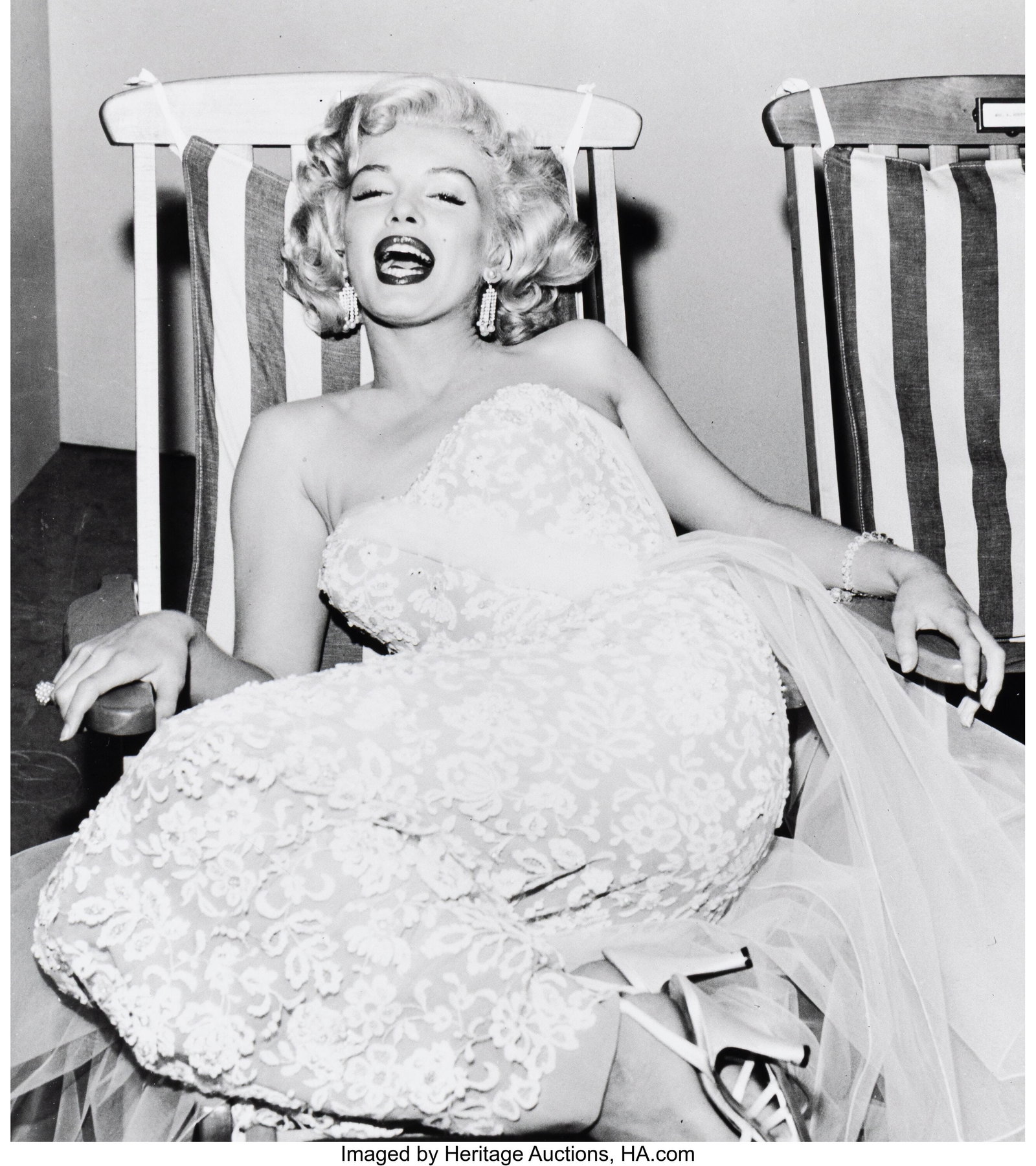 Frank Worth (American, 1923-2000) Marilyn Monroe: Frank Worth (American, 1923-2000) Marilyn Monroe in a Deckchair, 1954 Gelatin silver print, printed later 16-3/4 x 14-3/4 inches (42.5 x 37.5 cm&