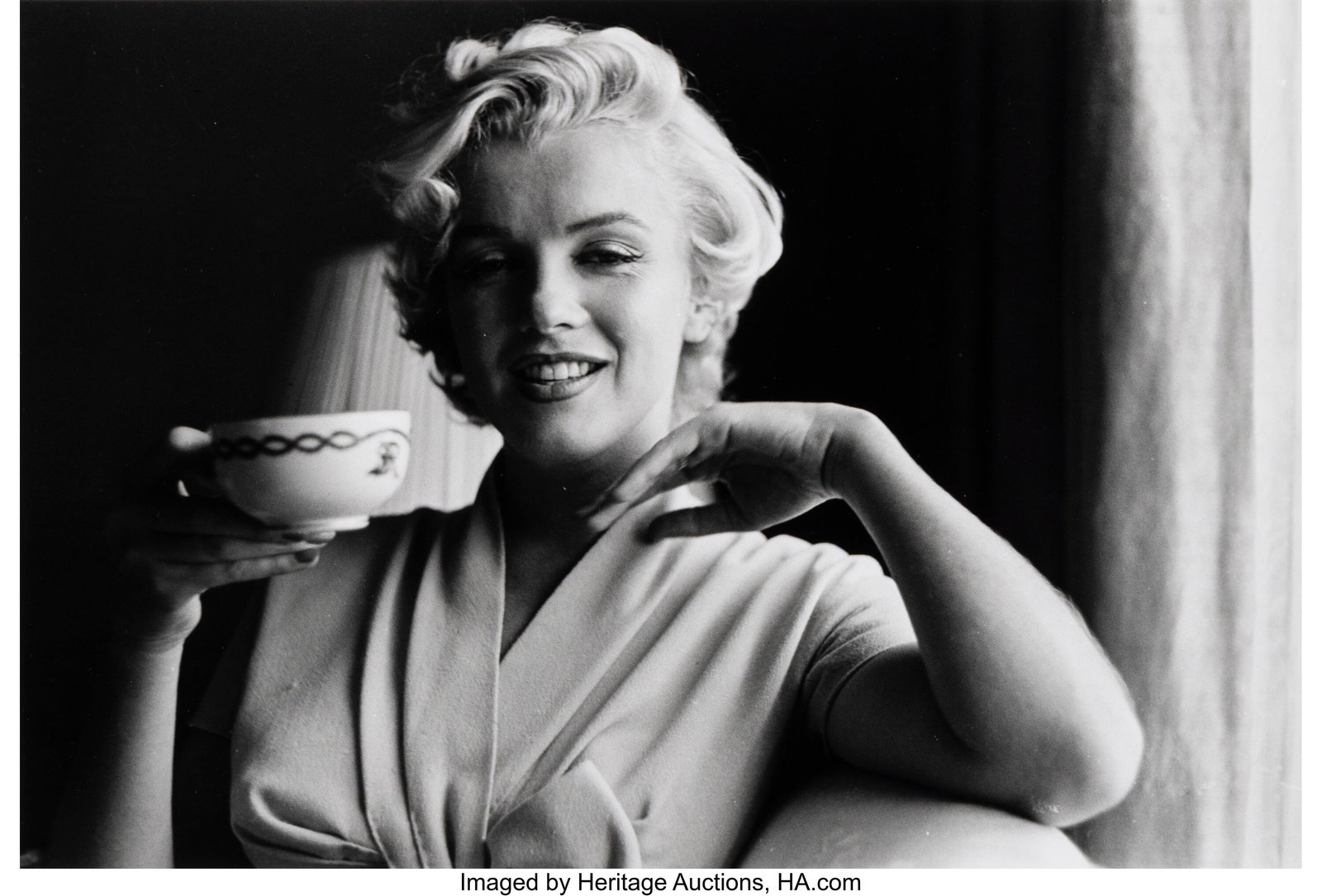 Sam Shaw (American, 1912-1999) Marilyn Monroe Ho: Sam Shaw (American, 1912-1999) Marilyn Monroe Holds a Cup of Tea at the Hotel St. Regis, 1954 Gelatin silver print, printed later 9 x 13-1/4 inches (22&peri