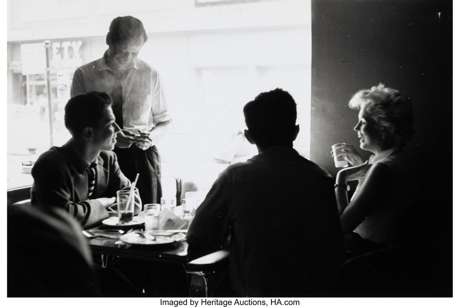 Roy Schatt (American, 1909-2002) Marilyn Eating : Roy Schatt (American, 1909-2002) Marilyn Eating at a Diner, 1955 Gelatin silver print 6-1/4 x 9-1/2 inches (15.9 x 24.1 cm) (image) 8 x 