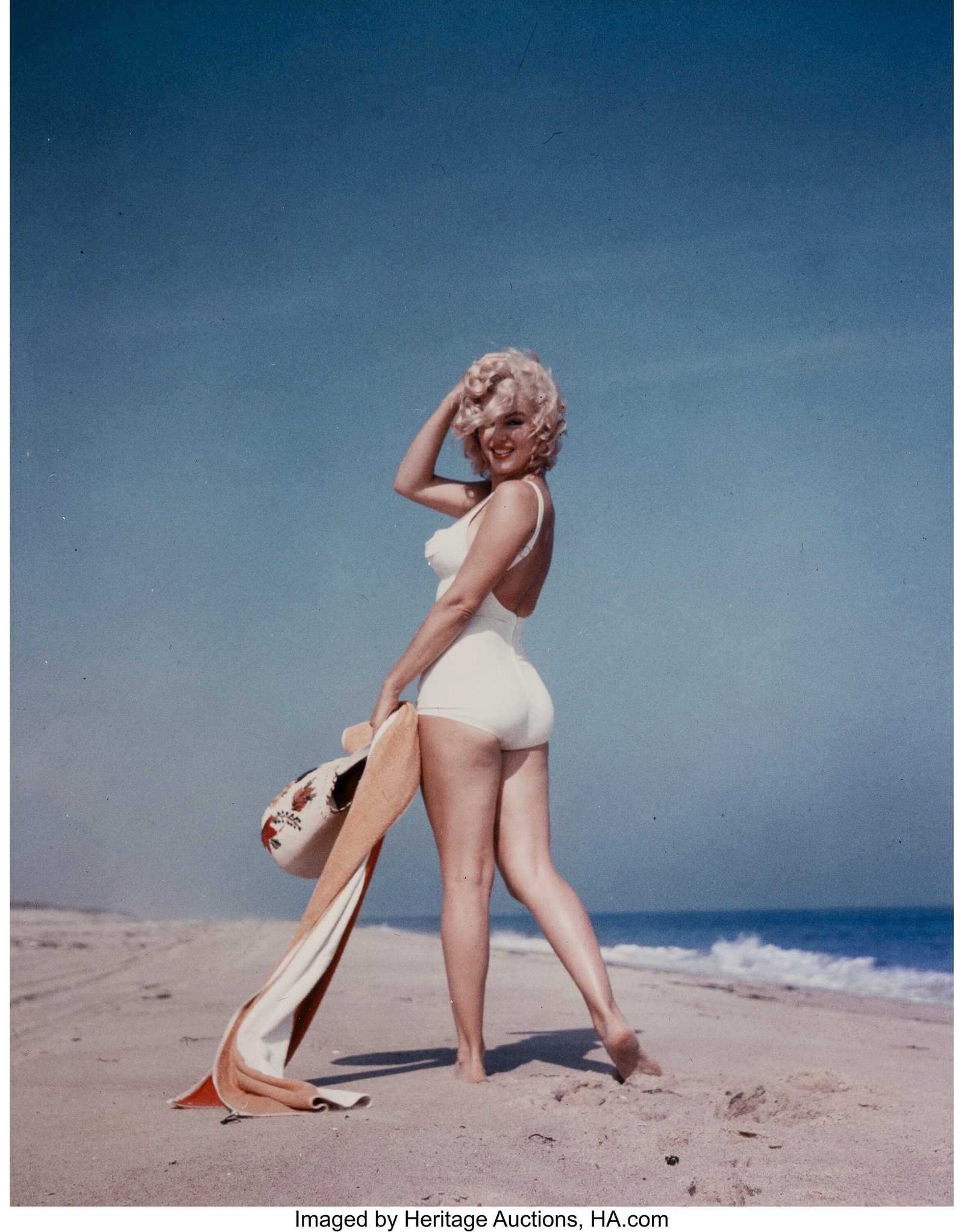 Sam Shaw (American, 1912-1999) Marilyn Monroe, A: Sam Shaw (American, 1912-1999) Marilyn Monroe, Amagansett Beach, New York, 1957 Dye coupler print, printed later 14 x 11 inches (35.6 x 27.9 