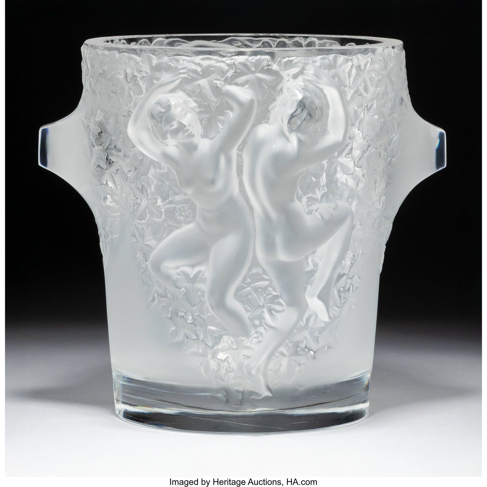 Lalique Ganymede Ice Bucket, post-1945 Clear and: Lalique Ganymede Ice Bucket, post-1945 Clear and frosted glass 9-1/8 inches (23.2 cm) Marks: Lalique France HID03101062020 © 2026 Heritage Auctions | All