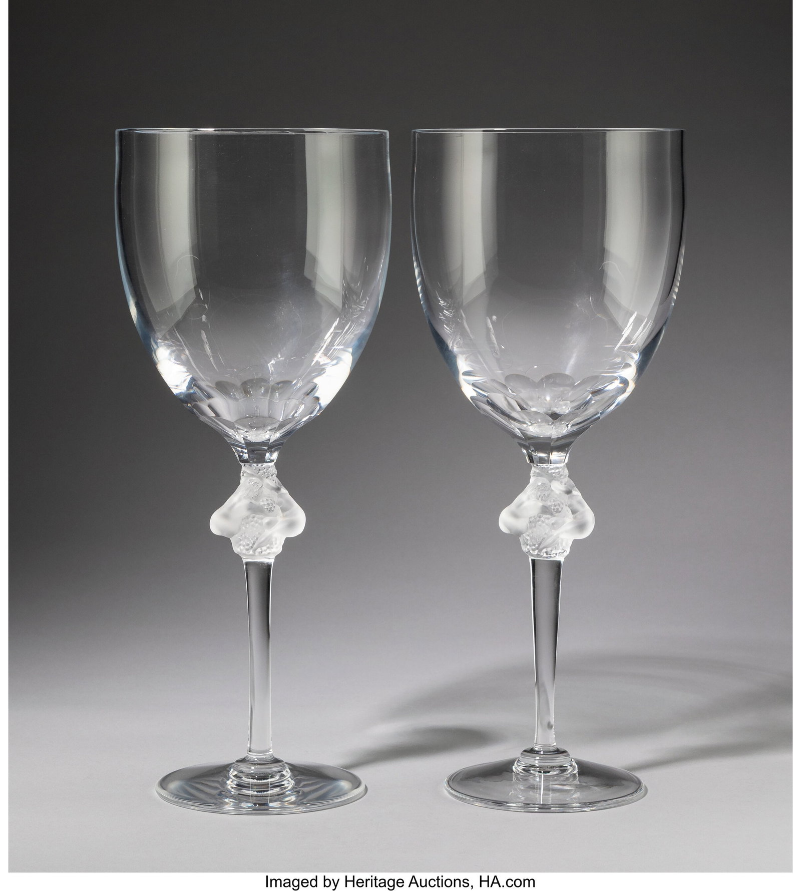 Lalique Two Roxane Flower Vases, post-1945 Clear: Lalique Two Roxane Flower Vases, post-1945 Clear and frosted glass 15-3/8 inches (39.1 cm) (each) Marks: Lalique, France HID03101062020 © 2026