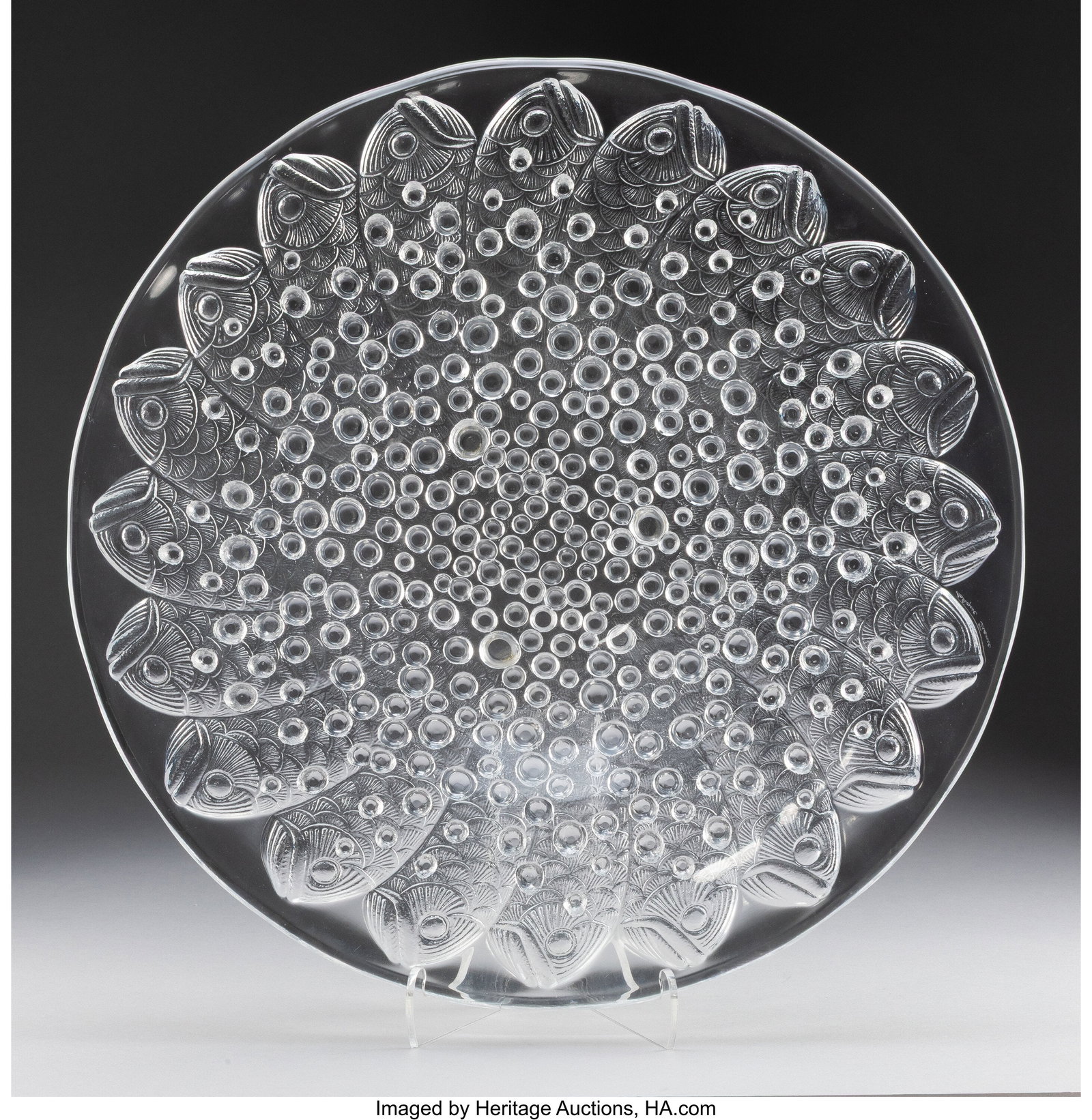 Lalique Roscoff Platter, post-1945 Clear glass 1: Lalique Roscoff Platter, post-1945 Clear glass 14-1/8 inches (35.9 cm) Marks: Lalique France Property from the Estate of Margaret Grace Carlton, Los Angeles