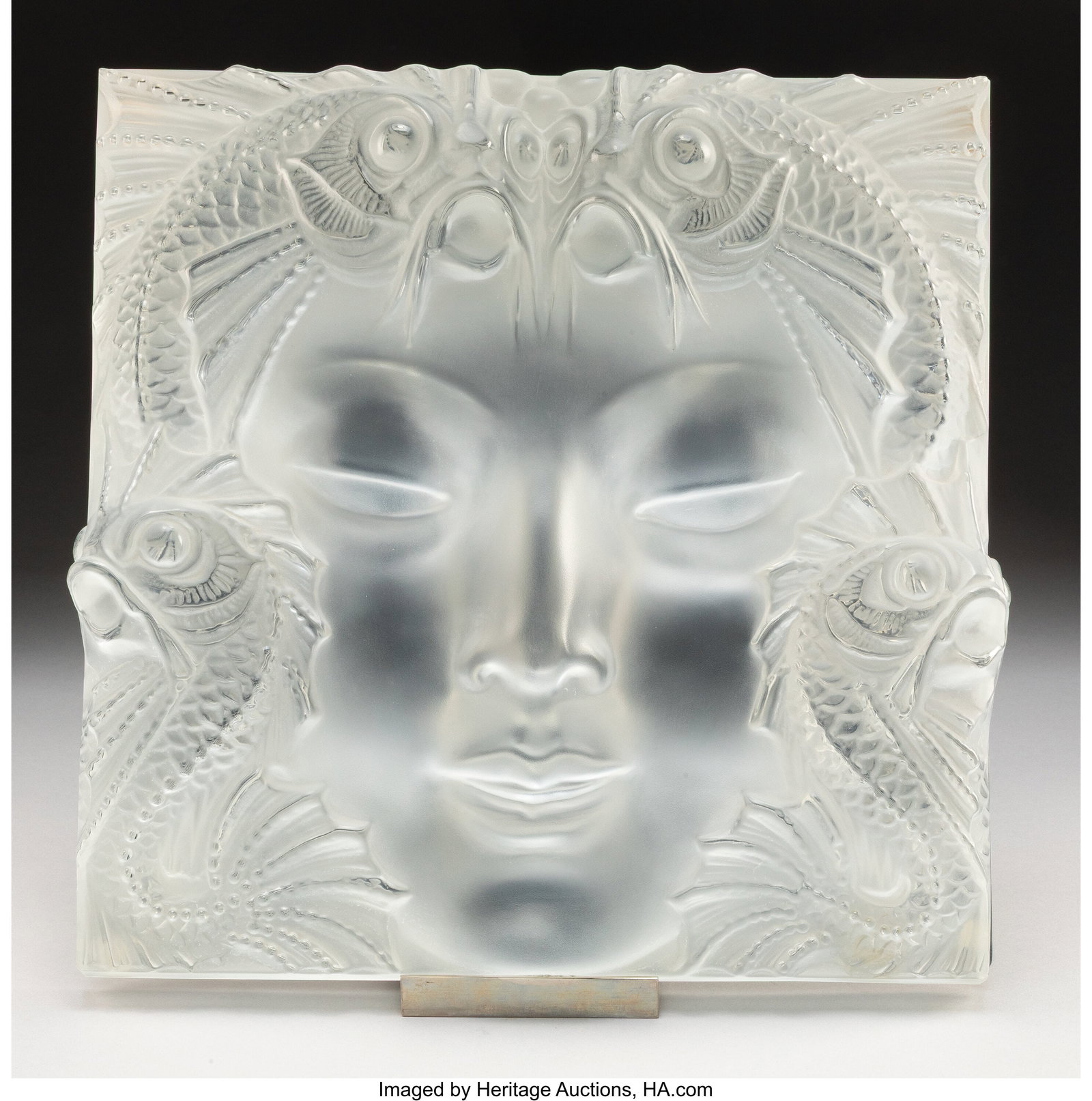 Lalique Masque de Femme Decorative Panel with Or: Lalique Masque de Femme Decorative Panel with Original Stand, post-1945 Clear and frosted glass, metal 12-5/8 x 12-1/2 x 2-1/2 inches (32.1 x 31.8 x 6&period