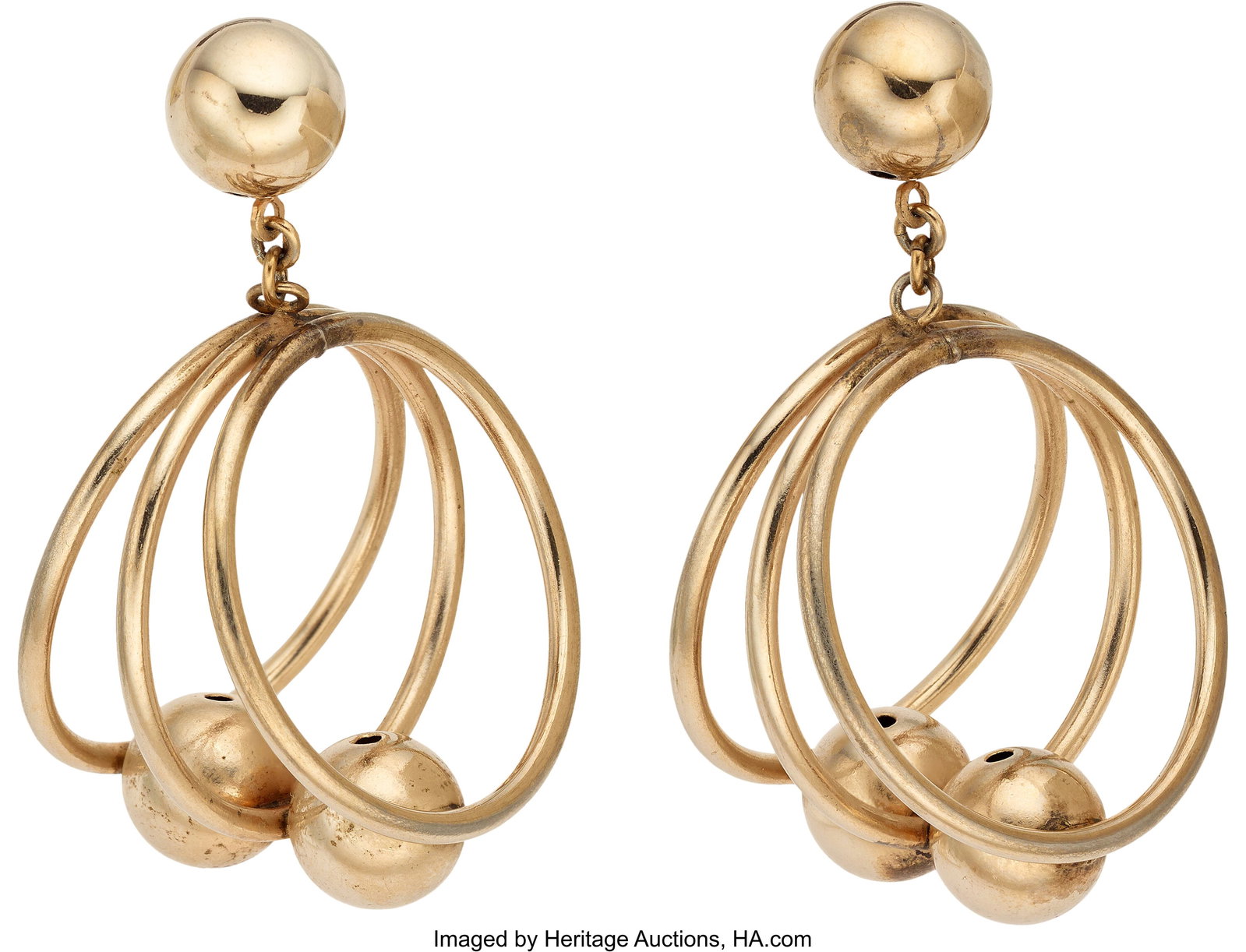 Marilyn Monroe Personal Triple Hoop Pendant Earr: Marilyn Monroe Personal Triple Hoop Pendant Earrings Worn While Blowing a Kiss to the Cameras in September 1954. Vintage original pair of triple hoop pendant earrings from Marilyn Monroe's pers