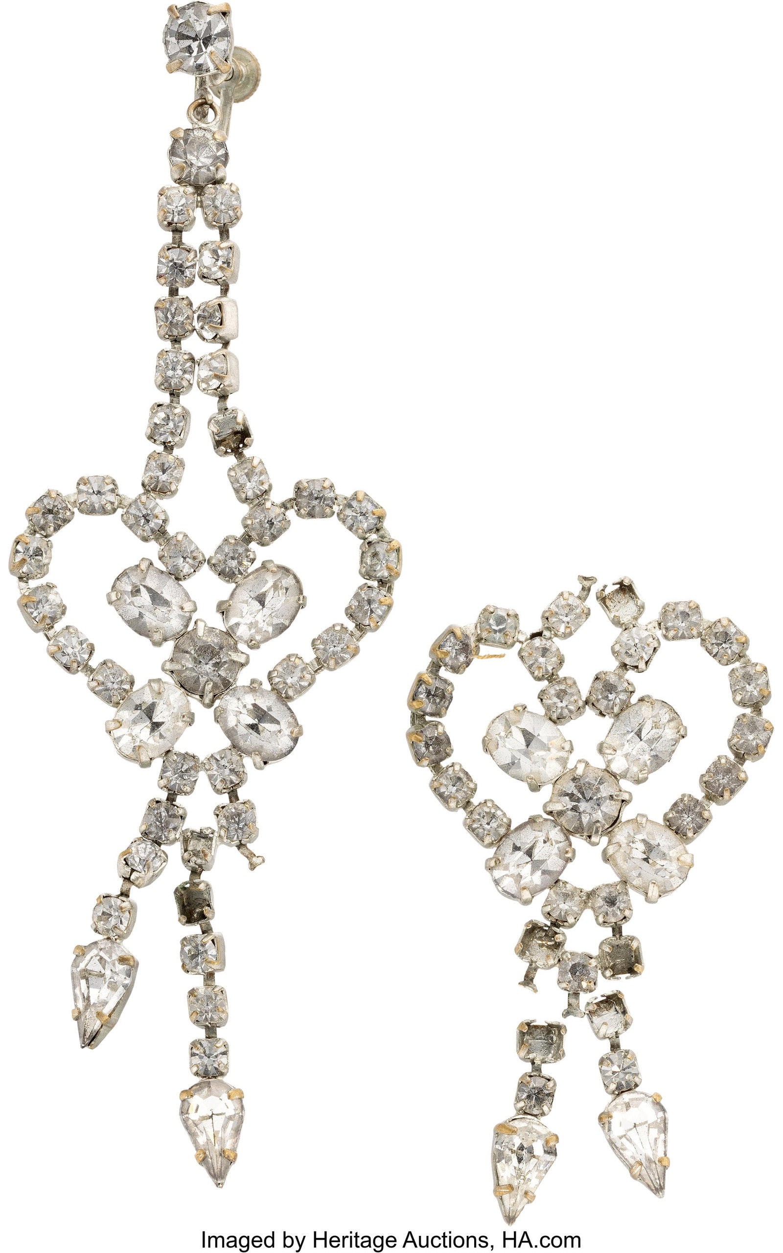 Marilyn Monroe Personal Pair of Rhinestone Earri: Marilyn Monroe Personal Pair of Rhinestone Earrings. Vintage original pair of rhinestone earrings from Marilyn Monroe's personal jewelry collection. Constructed of circular-cut simulated