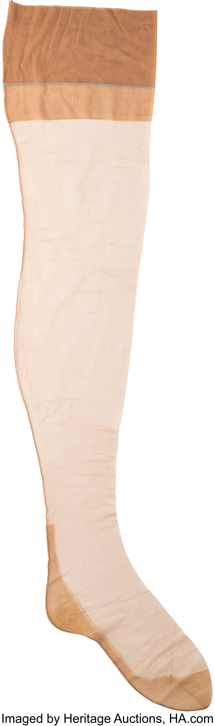 Marilyn Monroe Personal Nylon Stocking (ca. 1956: Marilyn Monroe Personal Nylon Stocking (ca. 1956). Vintage original nude-colored nylon stocking from Marilyn Monroe's personal wardrobe collection. Constructed of sheer 