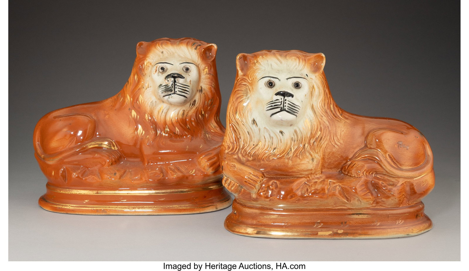 A Pair of Porcelain Staffordshire Lions, 19th ce (1 of 2)